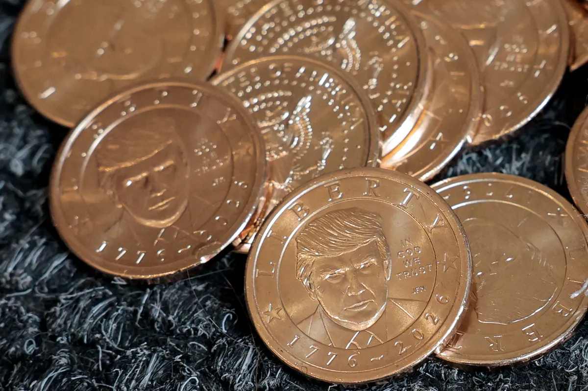Trumpov obraz po novem tudi na ameriškem kovancu