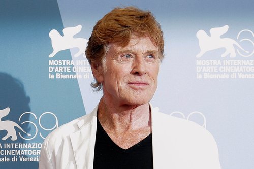 FILE PHOTO: Director Robert Redford poses during the photocall of the movie "The company you keep" at the 69th Venice Film Festival in Venice, Italy, September 6, 2012. REUTERS/Tony Gentile/File Photo