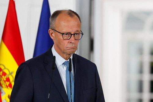 German Chancellor Friedrich Merz reacts next to Spanish Prime Minister Pedro Sanchez (not pictured) during a joint press conference in Madrid, Spain, September 18, 2025. REUTERS/Susana Vera