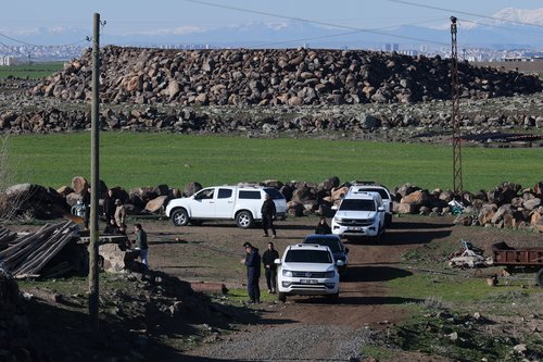 Turkish army and security personnel search a field after a piece of ammunition fell following the interception of a missile launched from Iran by a NATO air‑defence system, in Diyarbakir, Turkey, March 9, 2026. REUTERS/Sertac Kayar