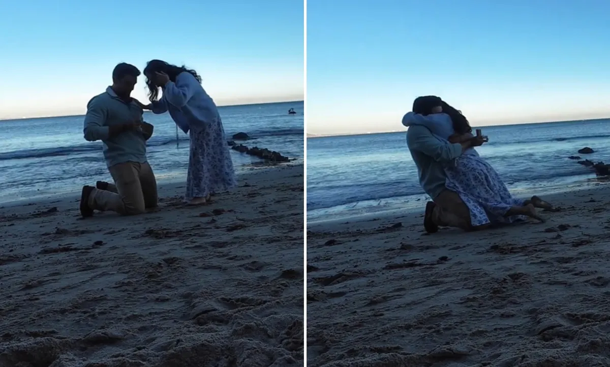 Romantična snubitev na plaži se je spremenila v prizor, ki je nasmejal milijone (VIDEO)