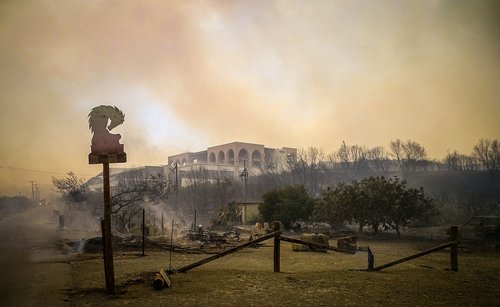 Wildfires burn forests on Greek island of Rhodes