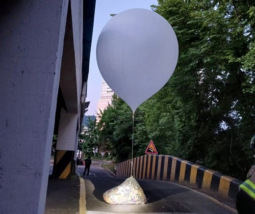 A balloon believed to have been sent by North Korea, carrying various objects including what appeared to be trash, is pictured in Incheon