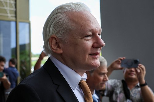 WikiLeaks founder Julian Assange following a hearing at U.S. District Court in Saipan