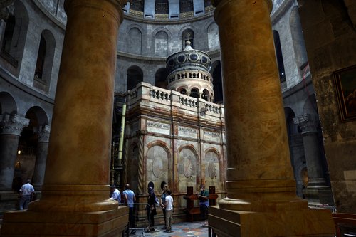 People visit the Church of the Holy Sepulchre in Jerusalem's Old City