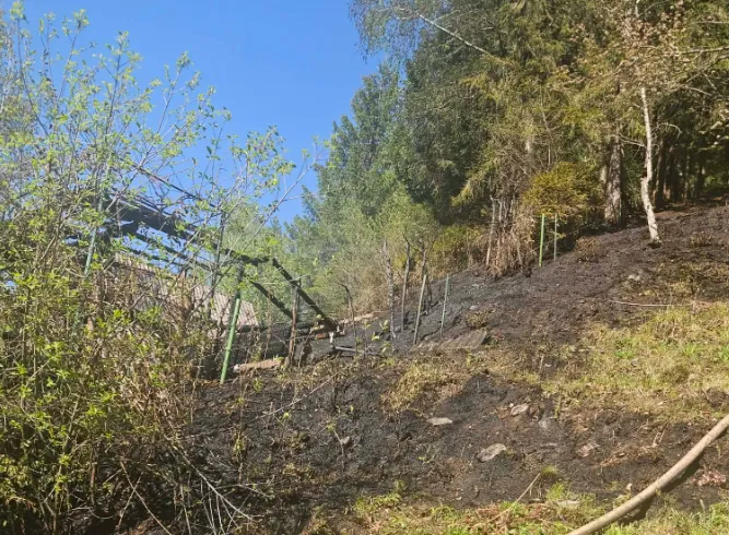 Gasilci med gašenjem počitniškega objekta pri Muti našli truplo