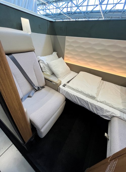 Qantas displays new first-class suite during a media presentation on "Project Sunrise" flights in Toulouse, France June 18, 2026. Picture taken with a mobile phone. REUTERS/Tim Hepher
