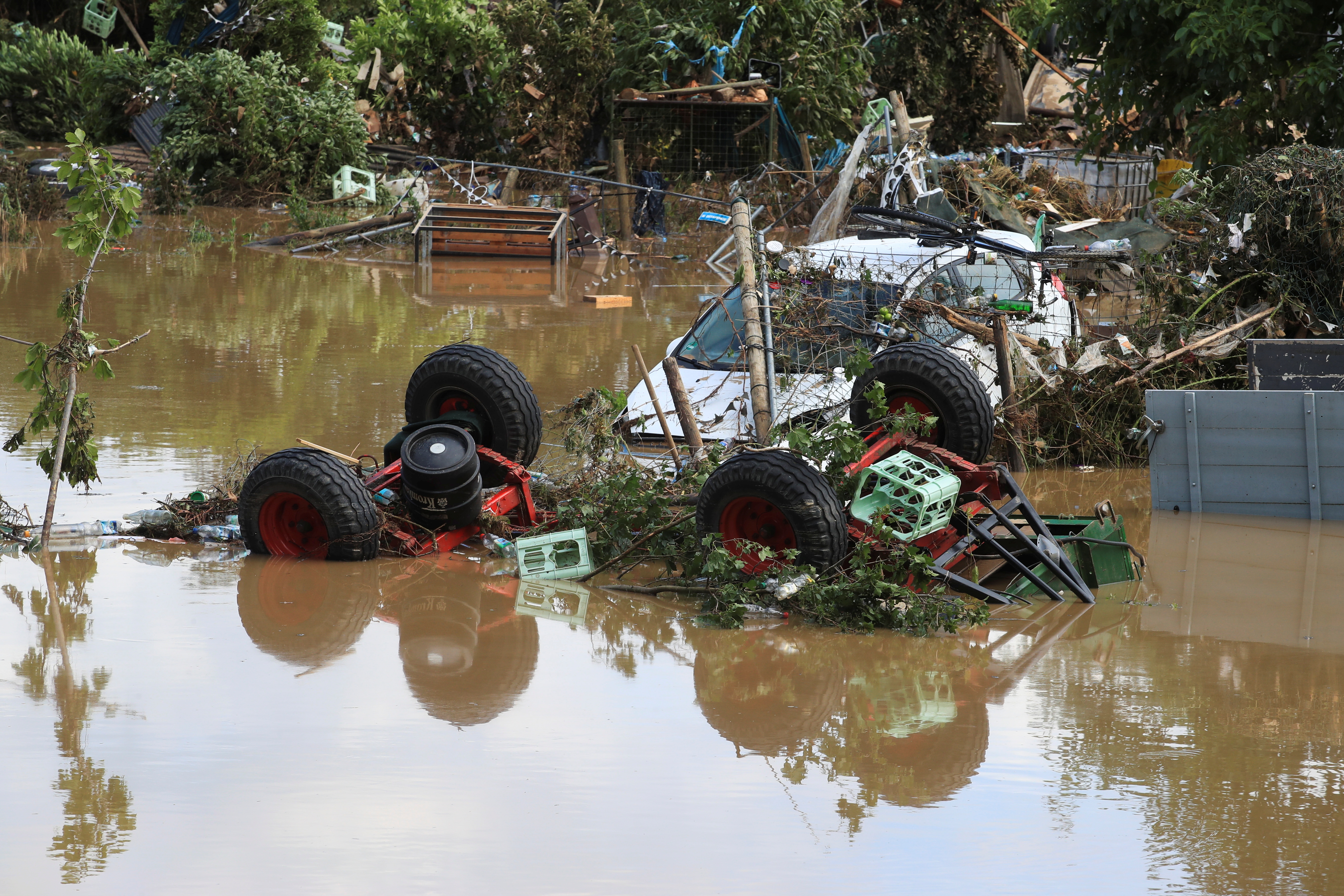 Partially submerged cars are seen on floodwaters following heavy rainfalls in Bad Neuenahr-Ahrweiler