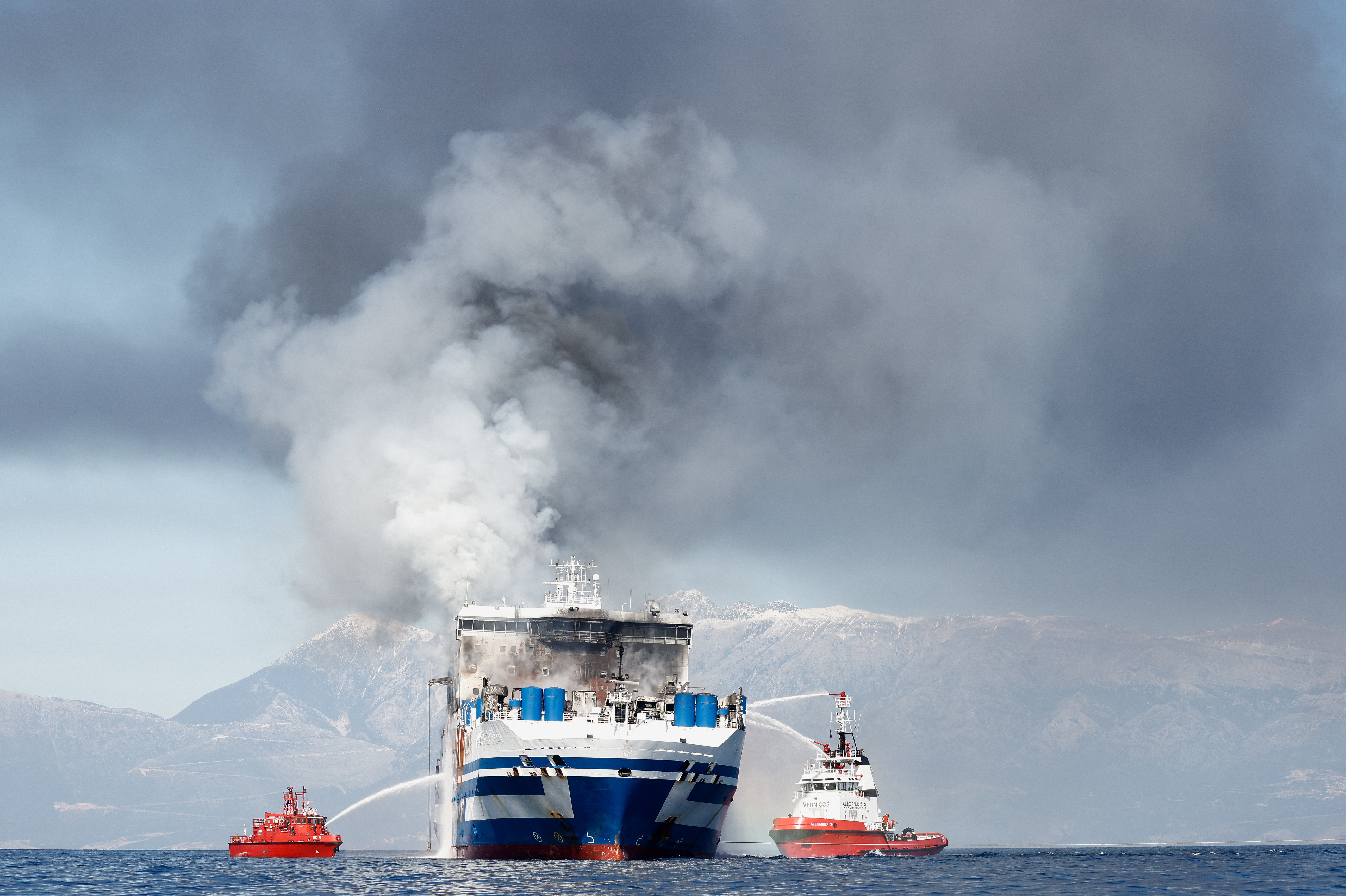 Smoke rises from the Italian-flagged Euroferry Olympia