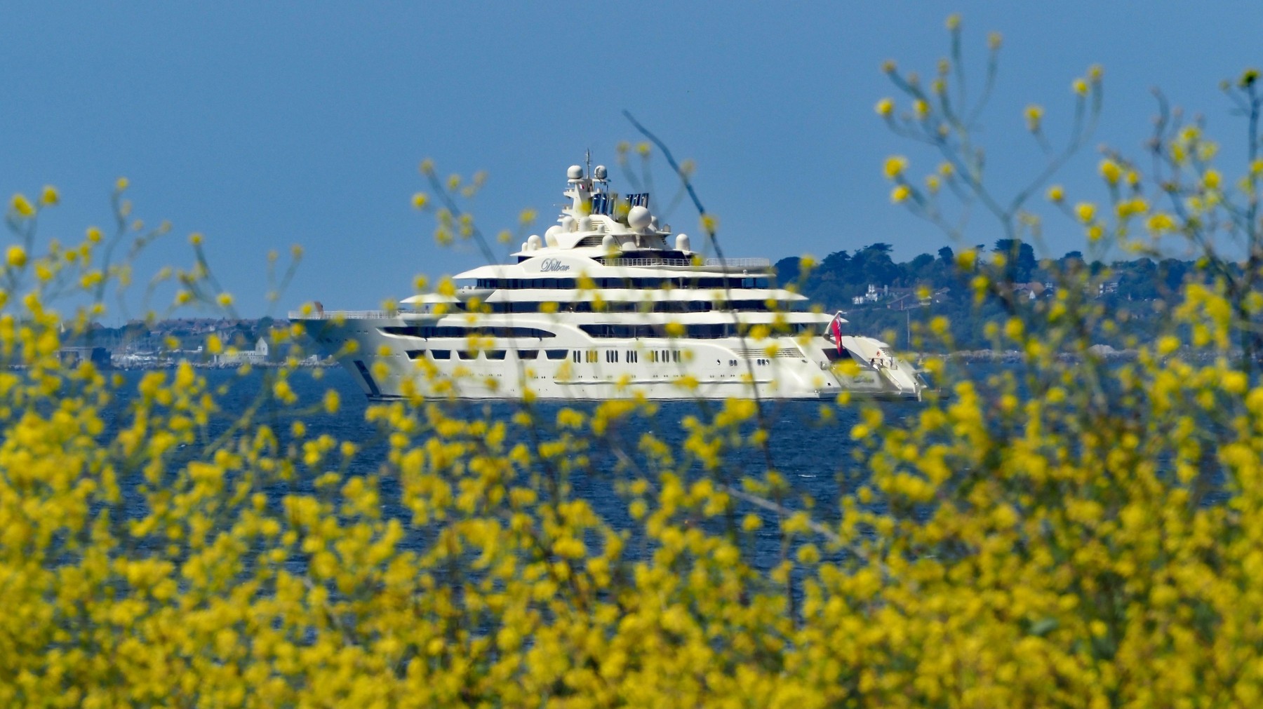 Super yacht Dilbar anchored off the Jurassic Coast in Dorset, UK - 09 Jun 2020