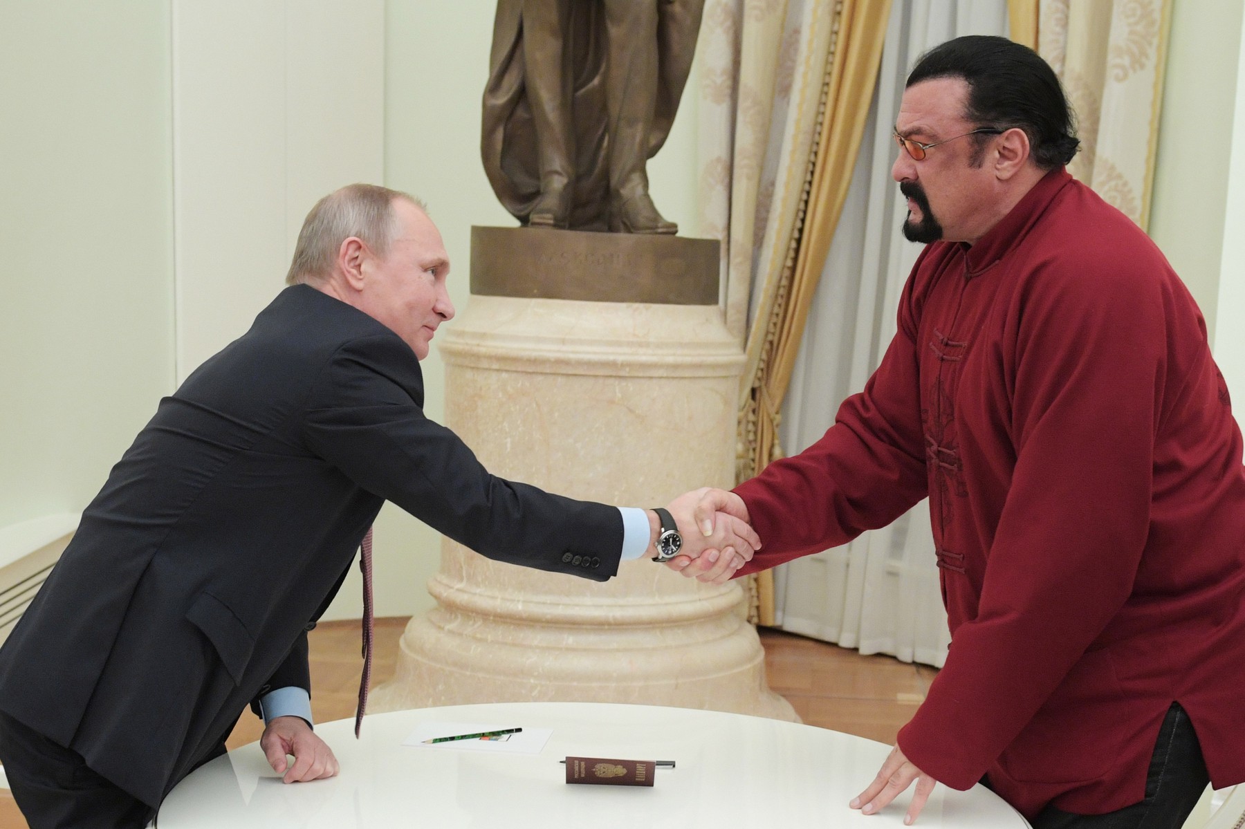 President Putin presents American actor Steven Seagal with Russian passport