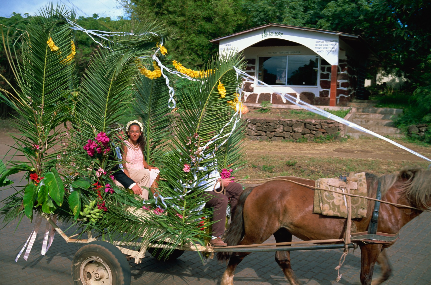Bride and groom in wedding procession, Hanga Roa, Easter Island, Chile, South America