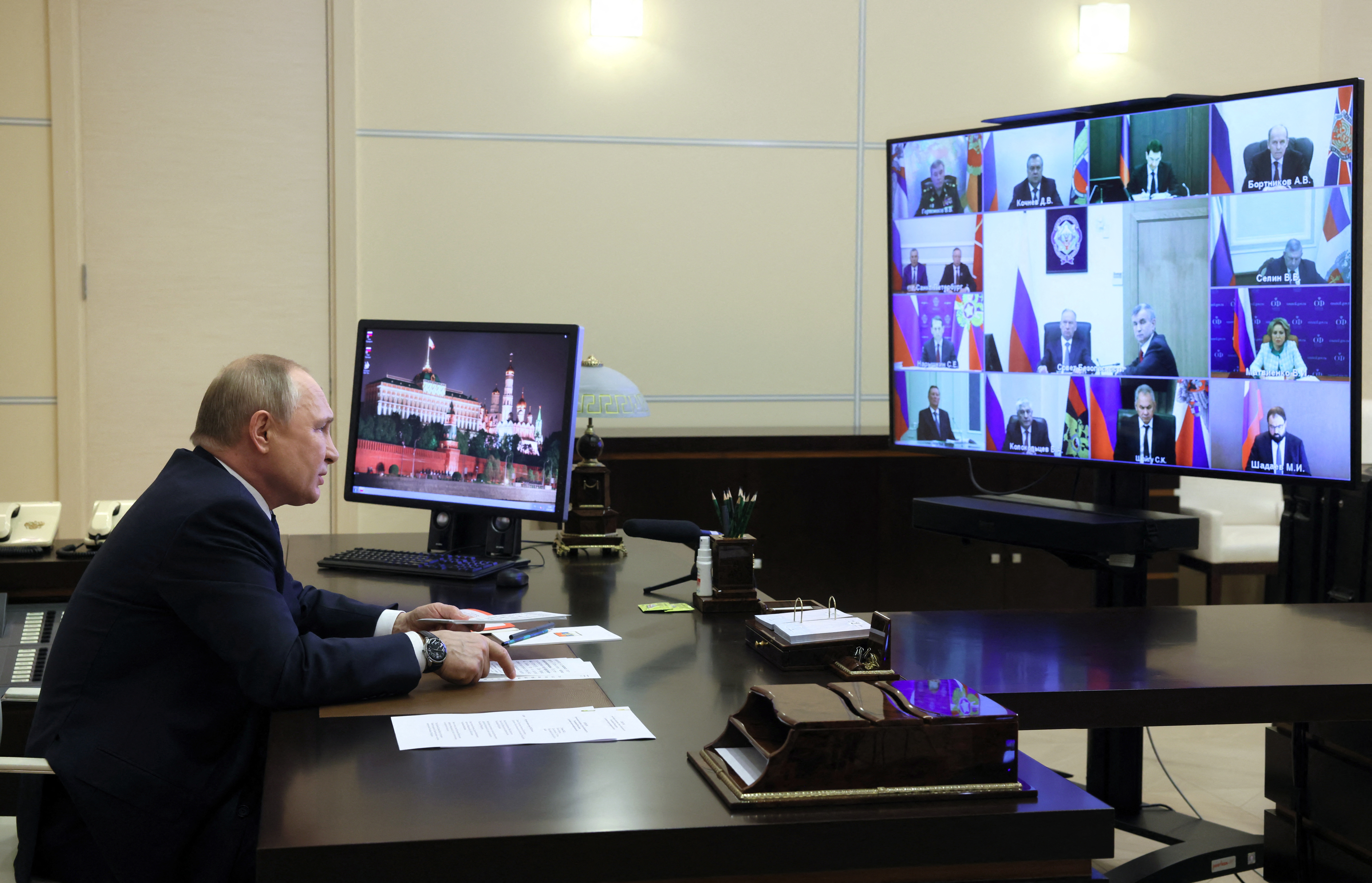 Russian President Putin chairs a meeting with members of the Security Council outside Moscow