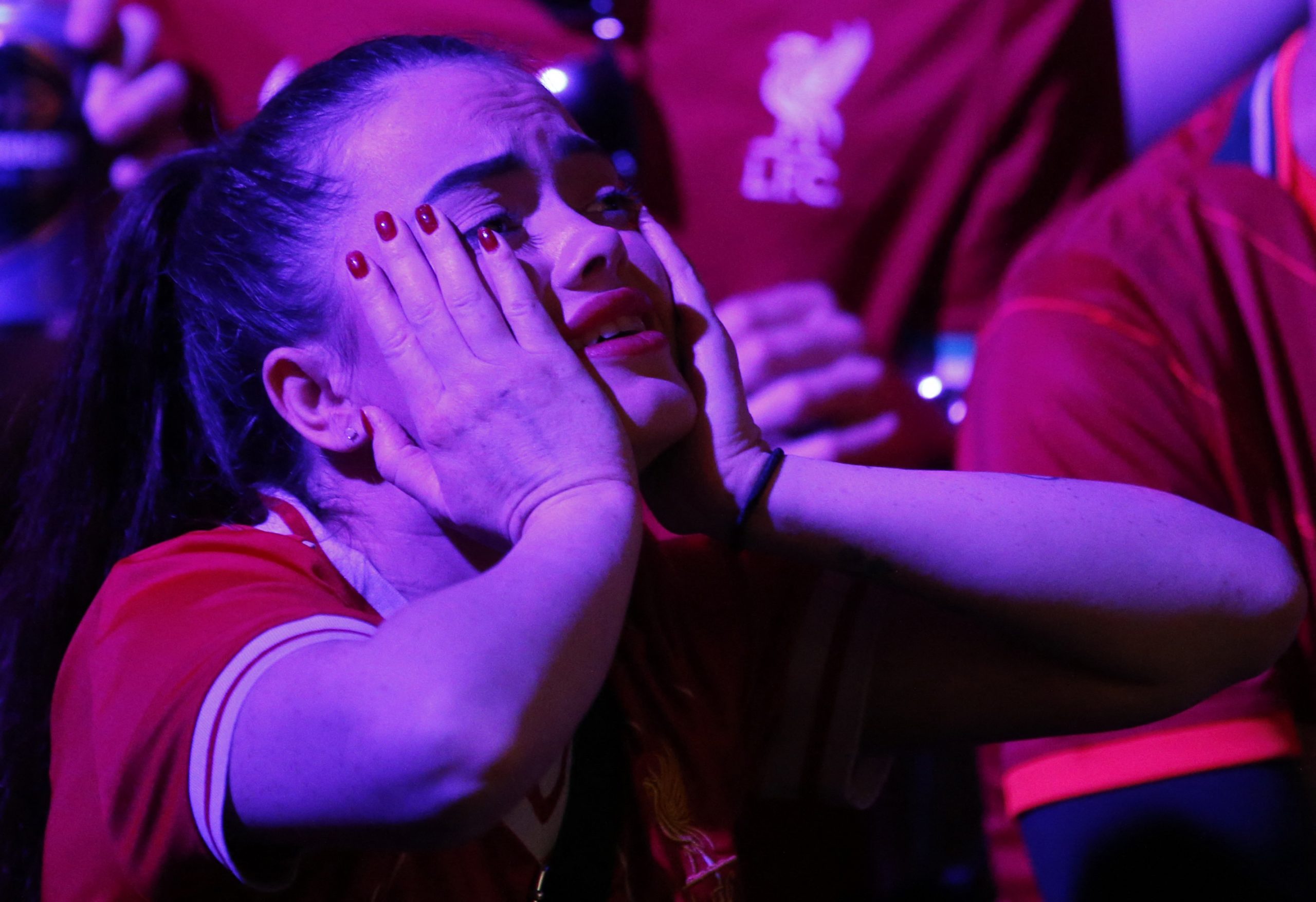 1653804044-2022-05-28T213008Z_744361866_UP1EI5S1NQ6Y7_RTRMADP_3_SOCCER-CHAMPIONS-LIV-MAD-LIVERPOOL-FANS-scaled.jpg
