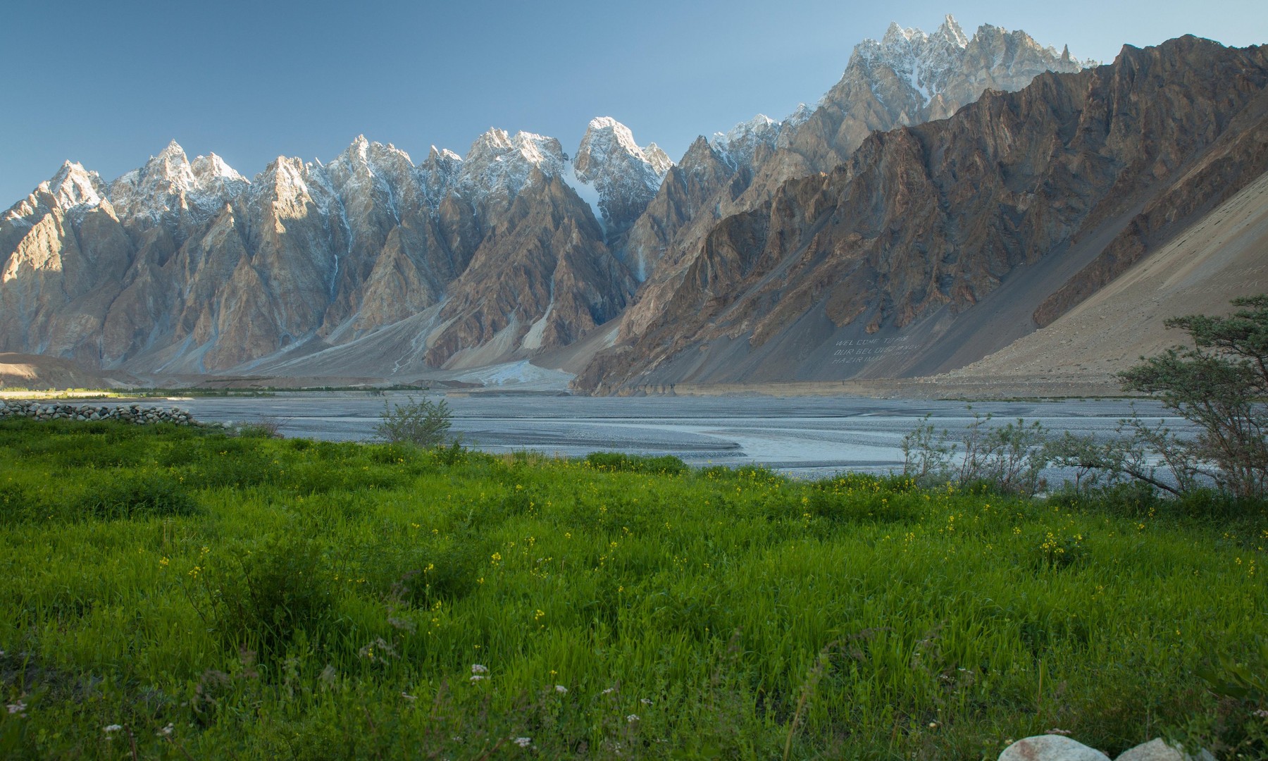 magnificent Tupopdan peaks and meadow along Hunza river in Passu, northern Pakistan