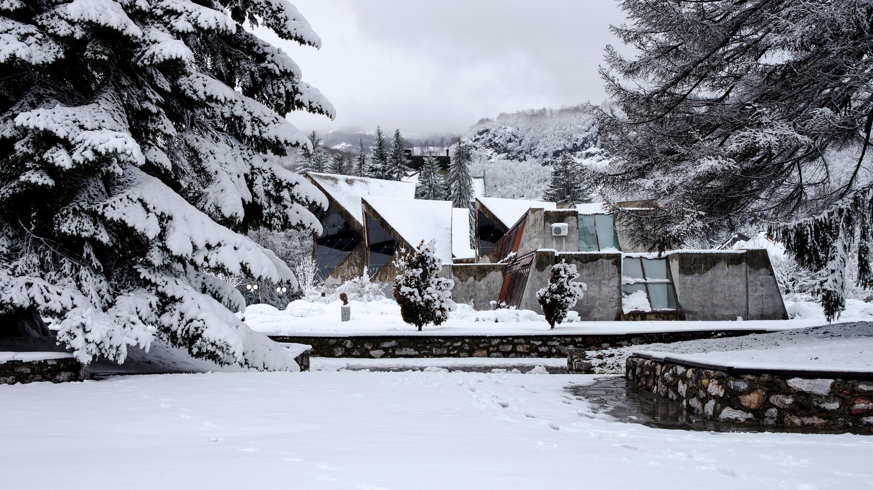 Town hall on central square after snowfall, Kolasin, Montenegro