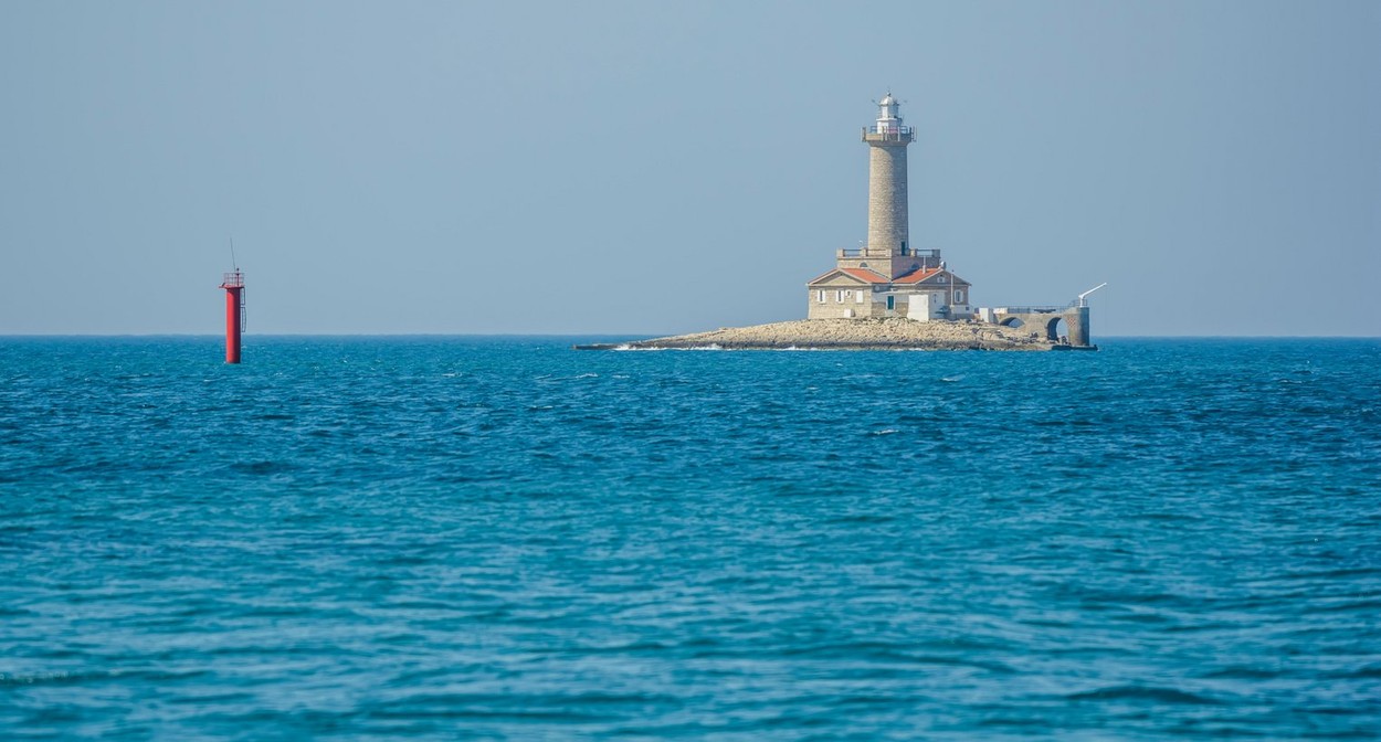 Porer Lighthouse - Croatia, Istria, Kamenjak. Porer lighthouse was built in 1833 on the islet of Porer. It is located southwest