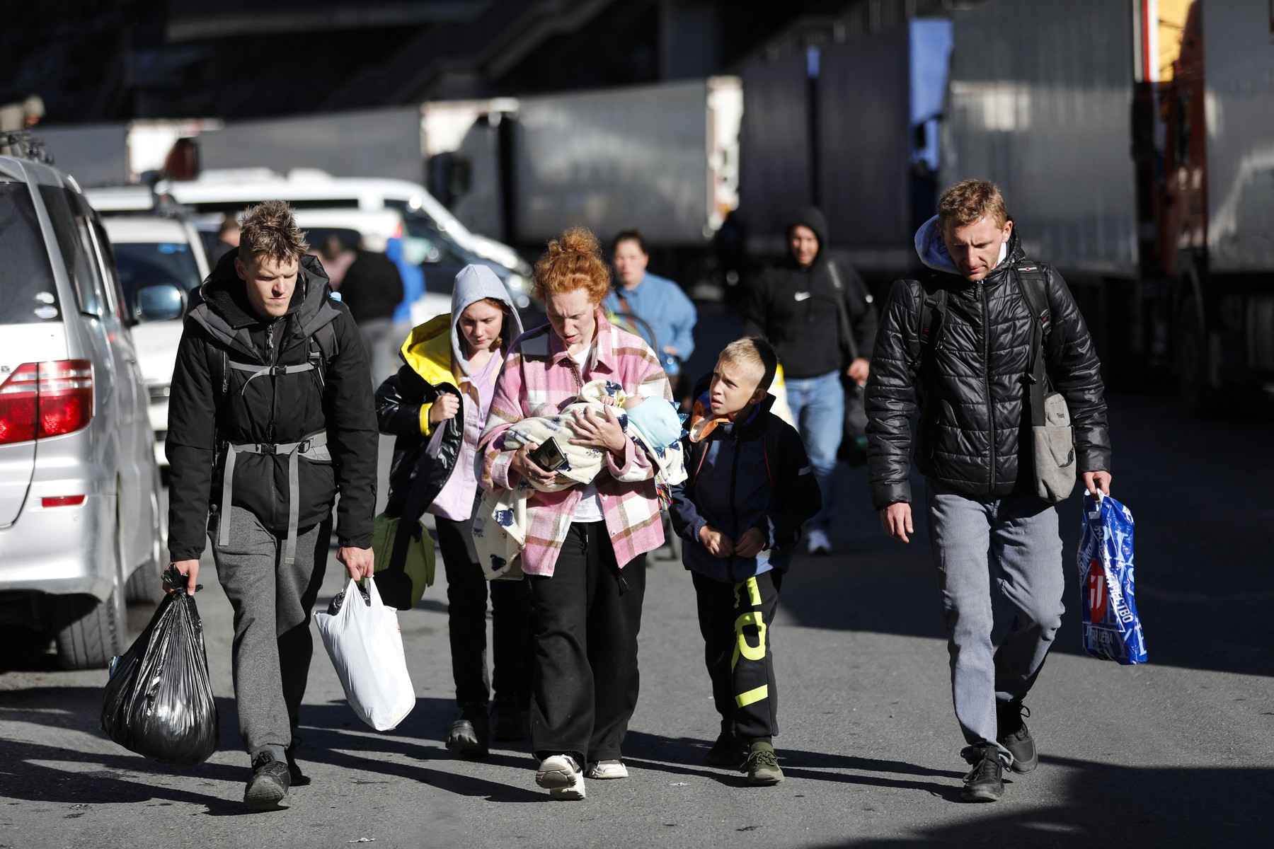 prebežniki, begunci, rusi, rusija, vojna,