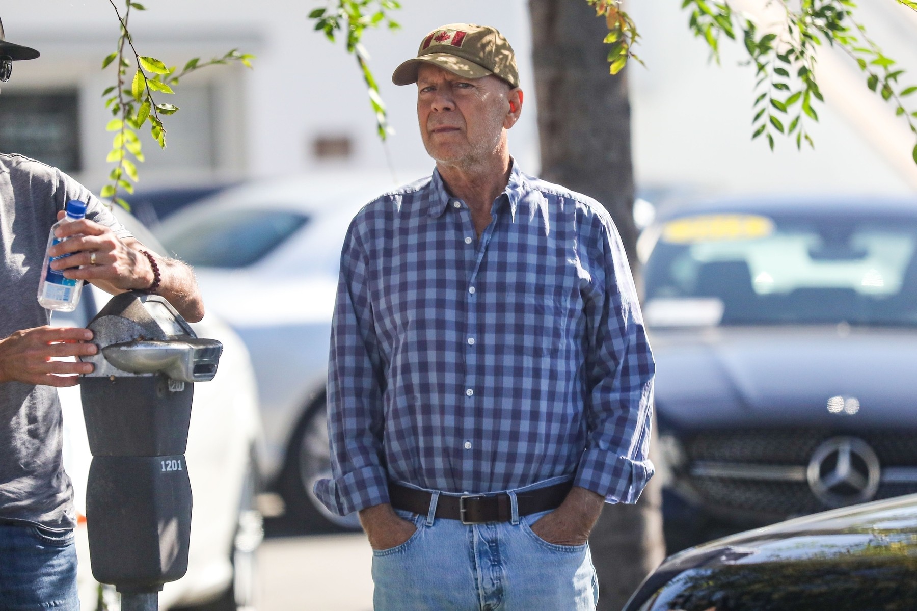 *EXCLUSIVE* Bruce Willis steps out for coffee with a friend amid news that he sold his digital image to Deepcake