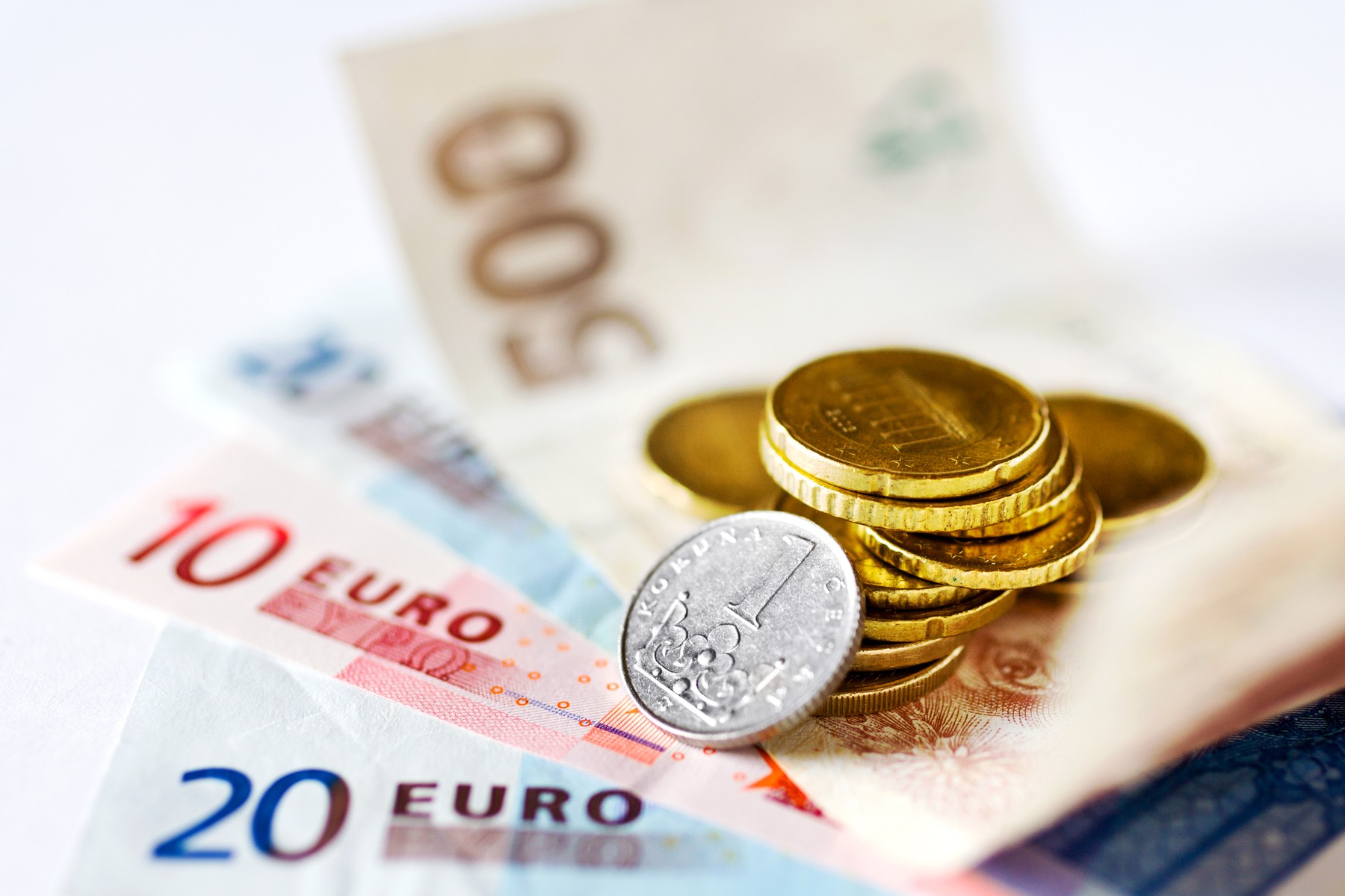 Czech money and Euro banknotes - European union and Czech republic - business and finance