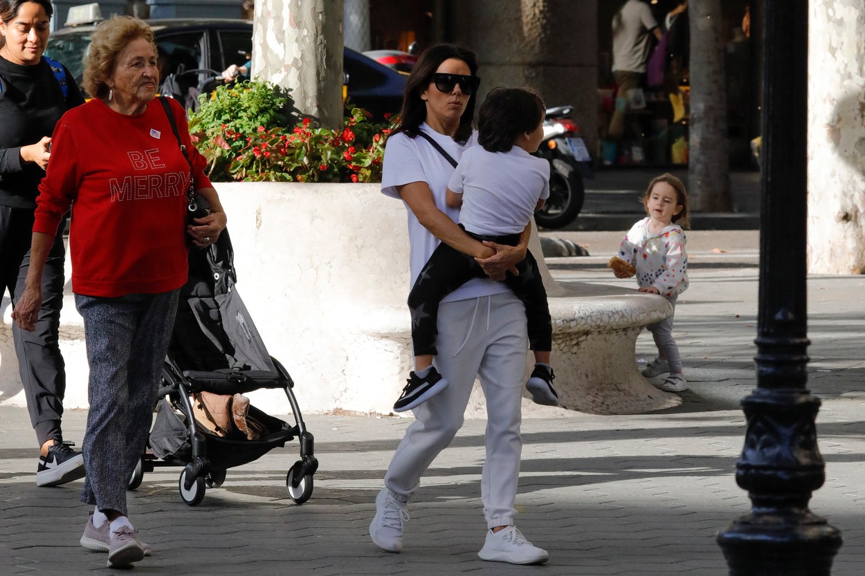 EXCLUSIVE: Eva Longoria kisses and laughs with her son and her family in Barcelona