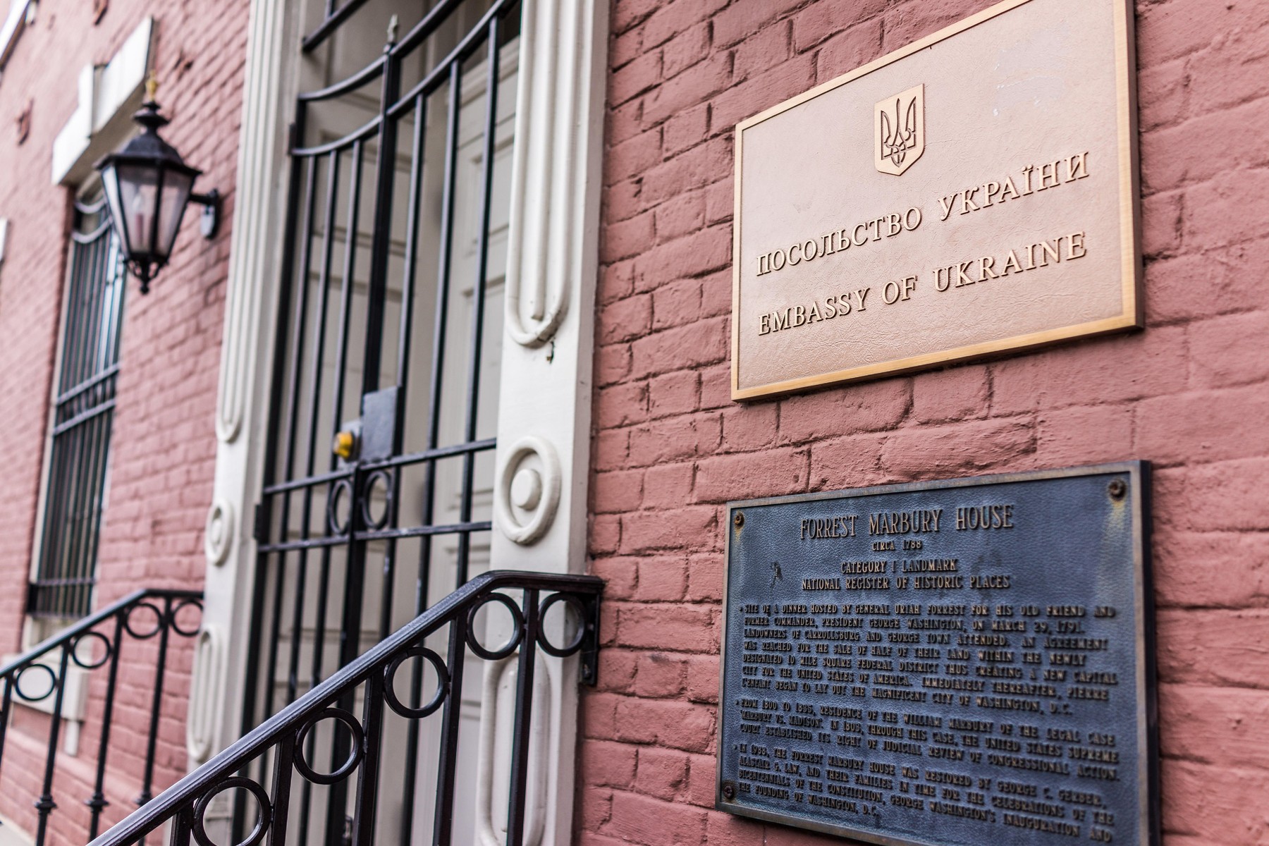 Washington DC, USA - March 20, 2017: Ukrainian embassy sign with symbol by entrance in Georgetown