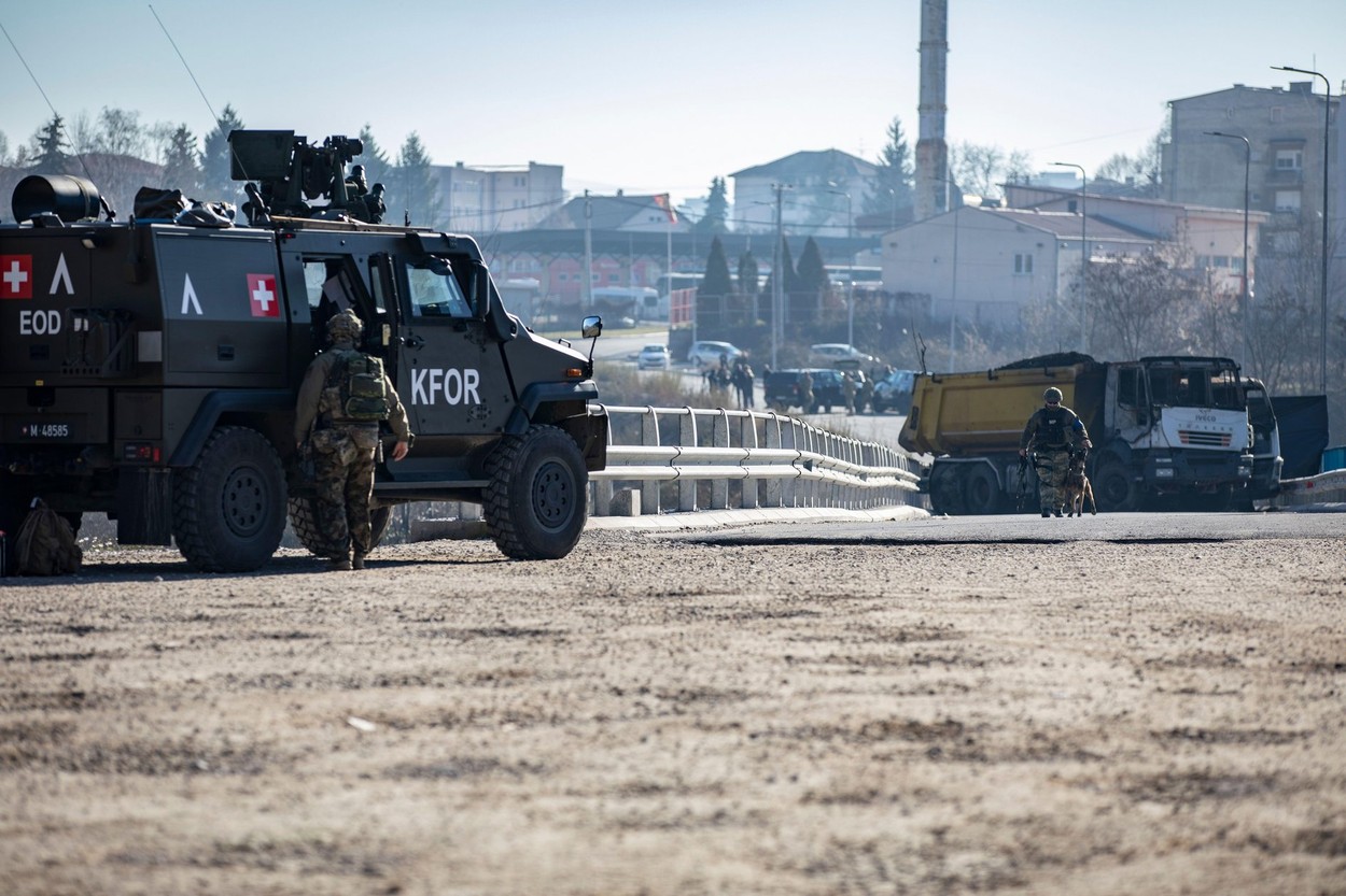 KFOR Regional Command-East (RC-East) clears a bridge in Mitrovica, Kosovo on Jan. 3, 2023. During the operation, Swiss Army Soldiers with the Freedom of Movement-Detachment (FOM-D) used heavy engineer equipment to remove two trucks from the bridge to rees