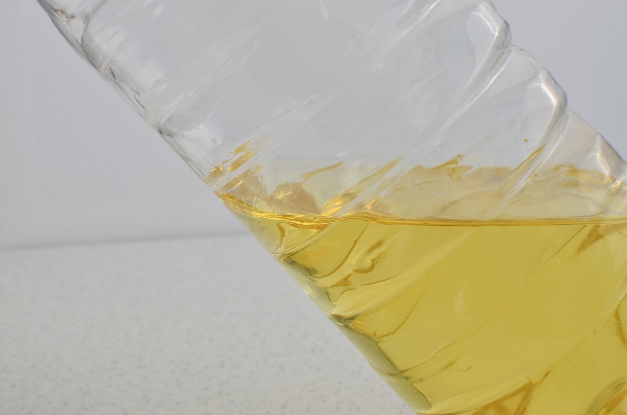 Close-up frying oil container, ready to add a special touch to your meals.