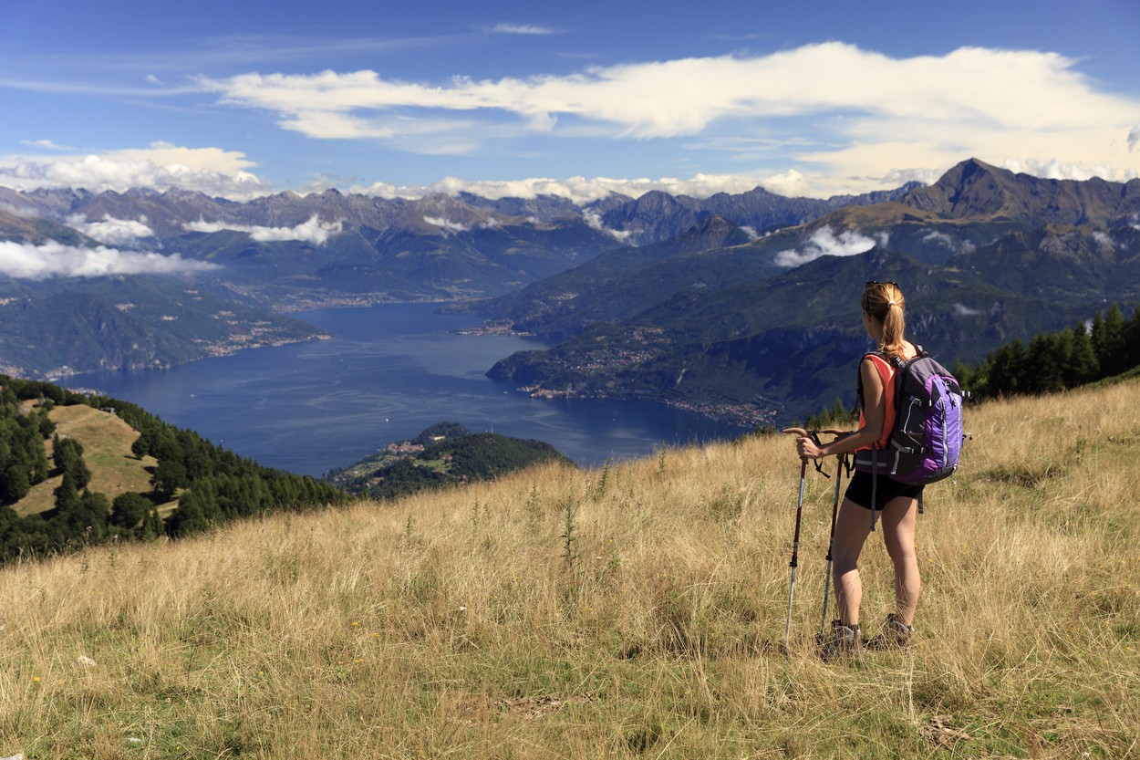 bellagio,clouds,comolake,girl,grass,hiker,lake,lario,backpacking,mountains,horizontal