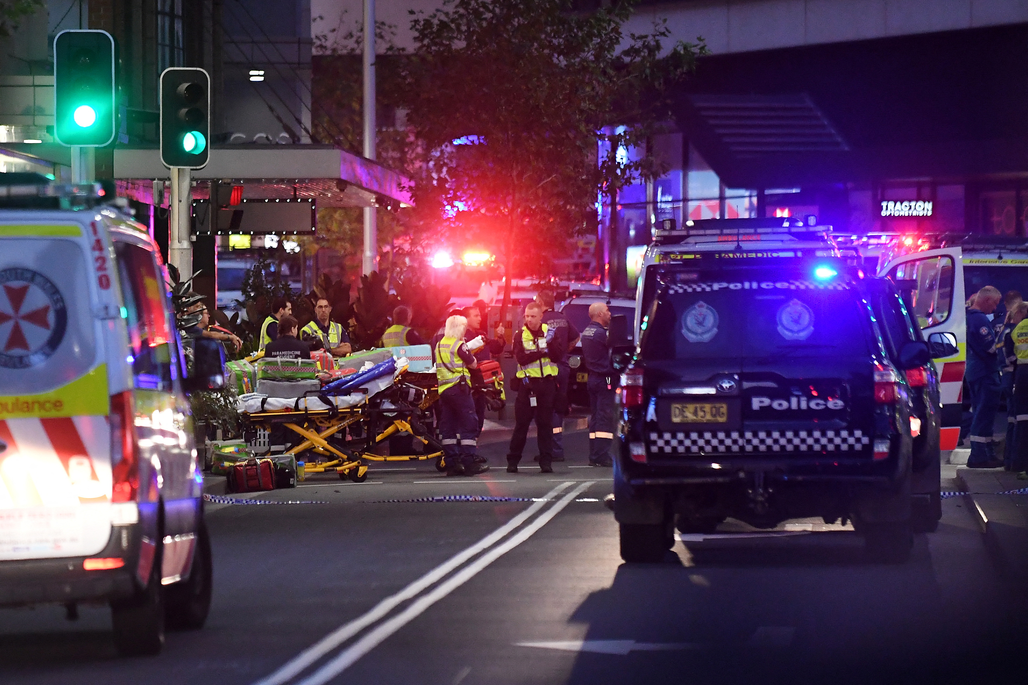 Emergencyservice workers work near Bondi Junction after multiple people were stabbed inside the Westfield Bondi Junction shopping centre in Sydney