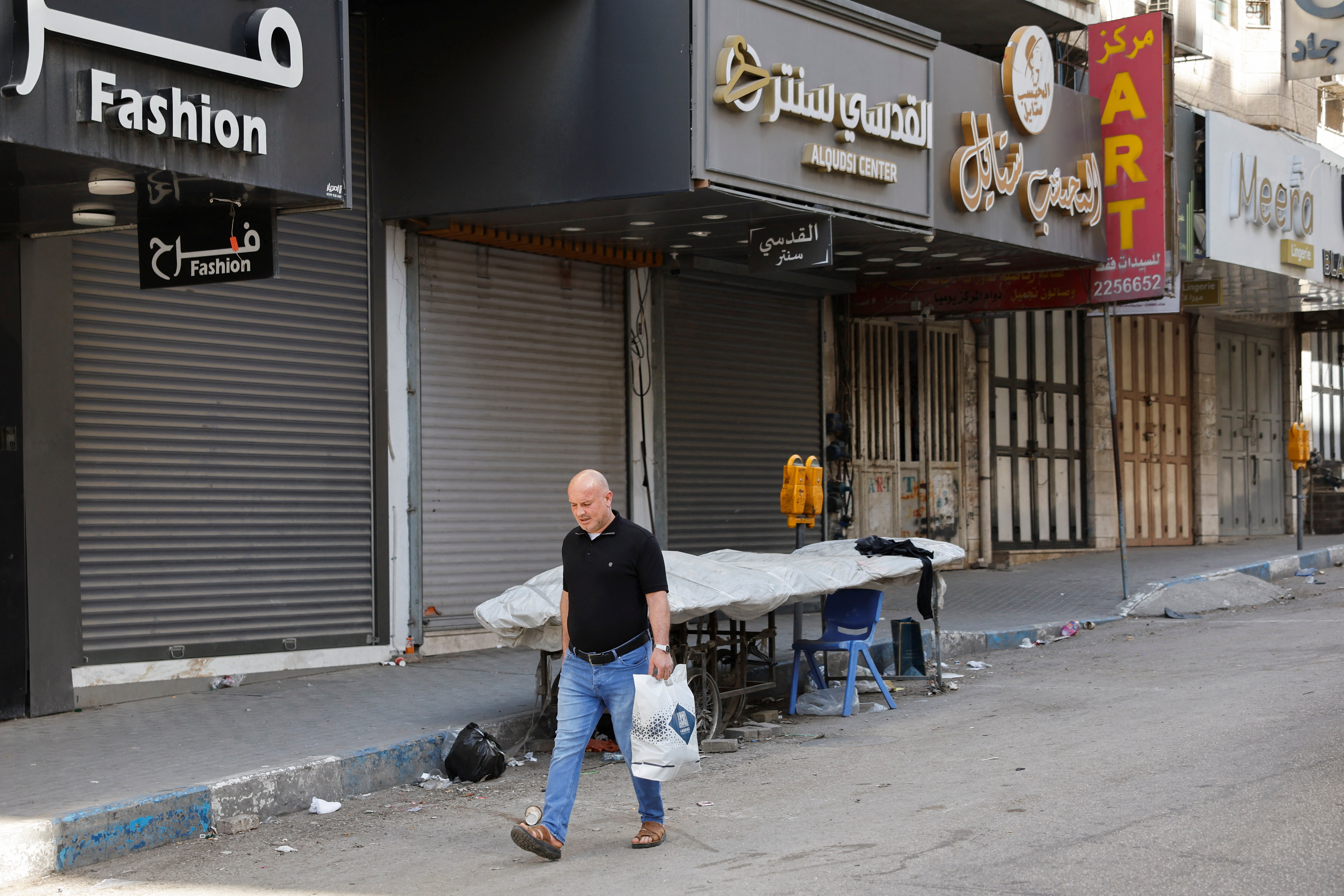 Splošna stavka v Hebronu (Foto: REUTERS/Mussa Qawasma)