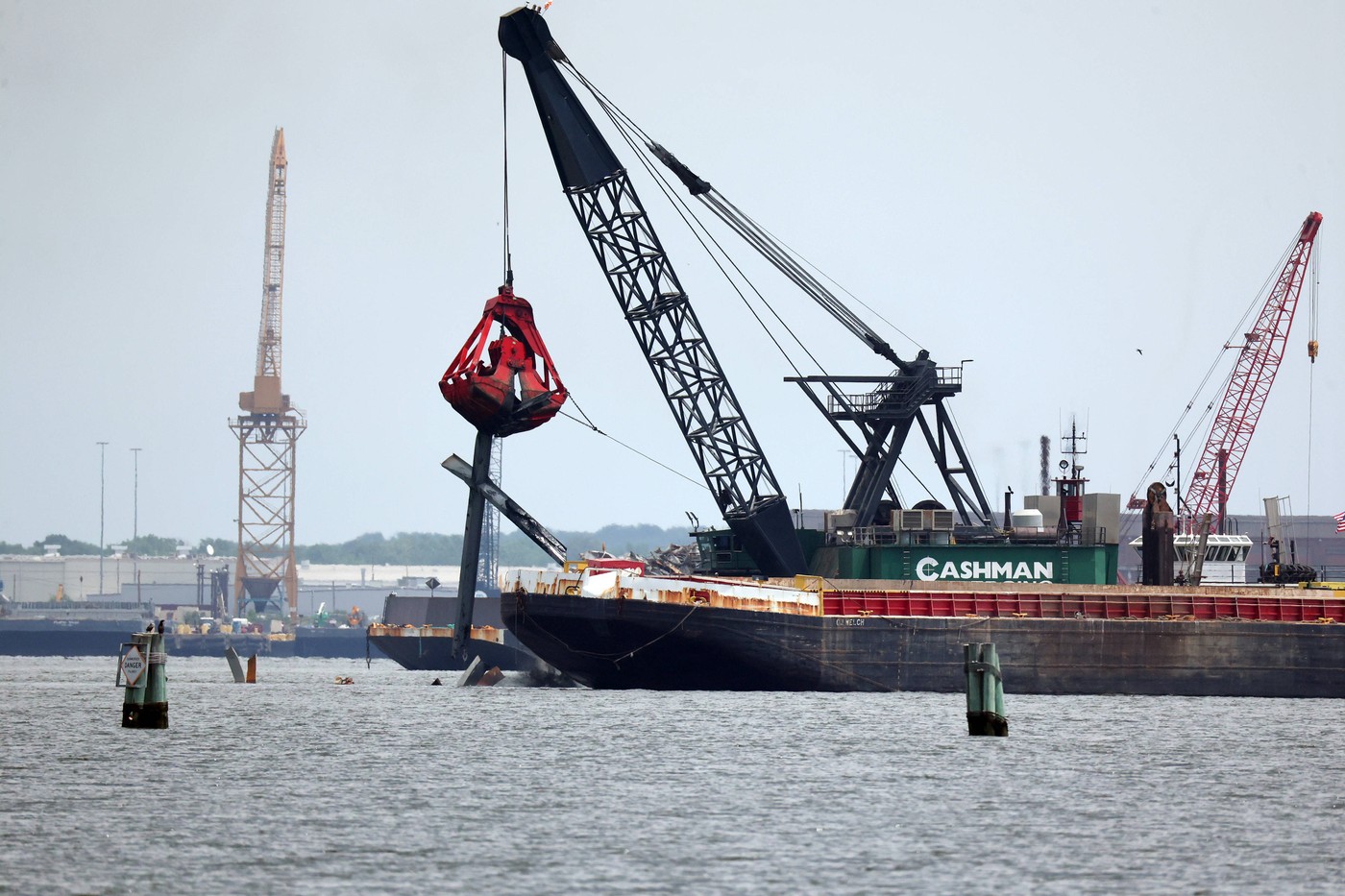 BALTIMORE, MD - MAY 20: View of a crane boat as the shipping boat, Dali heads back to port after crashing into the Franc