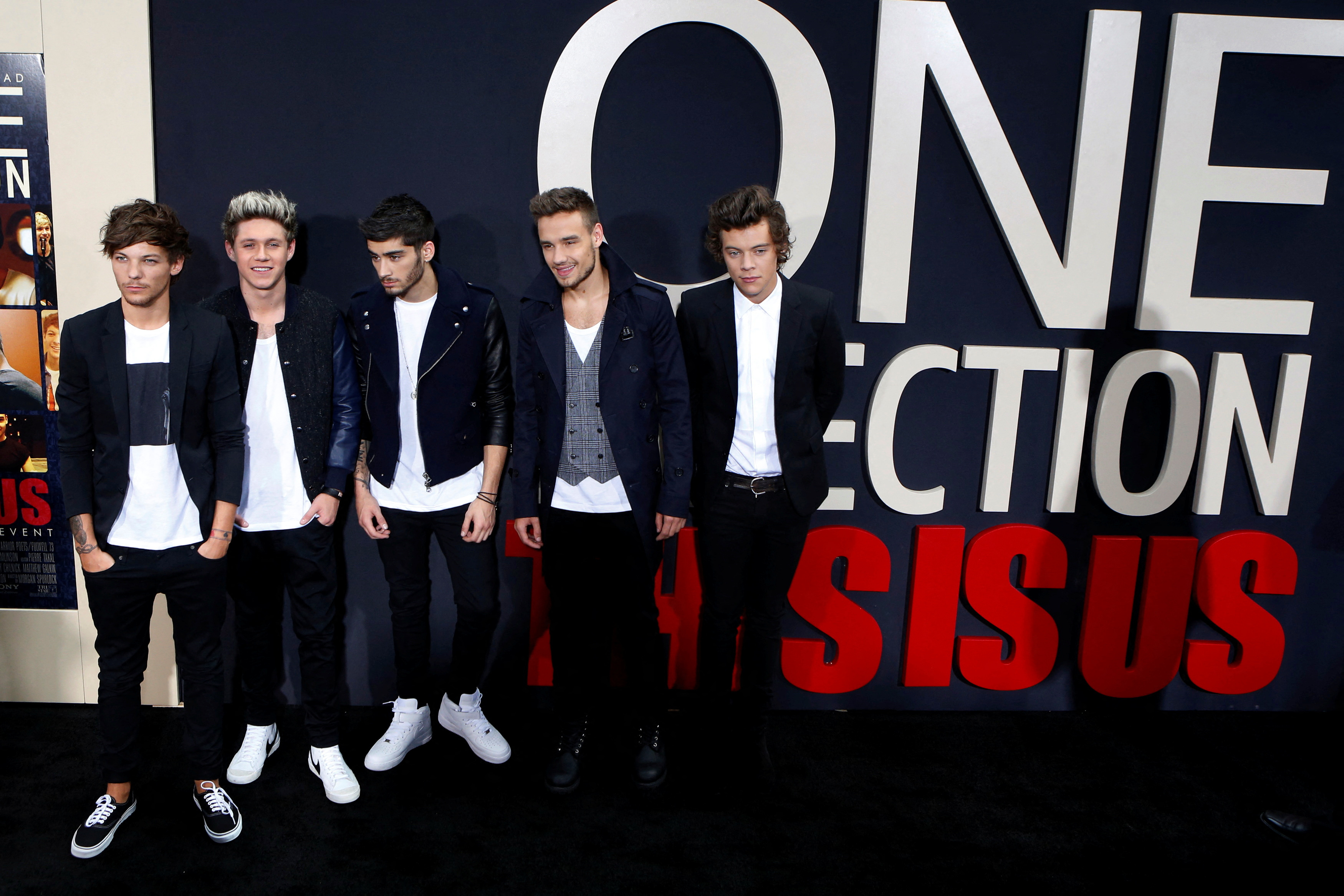 FILE PHOTO: Members of British boy band One Direction arrive for the premiere of their documentary film "This is Us" in New York