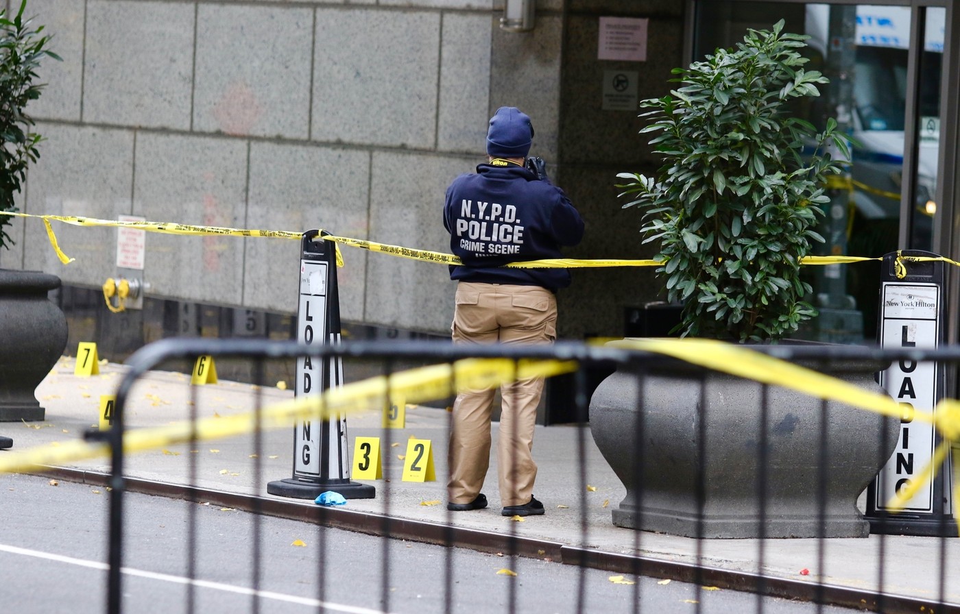 US health executive shot dead in 'targeted attack' - GVs of the crime scene