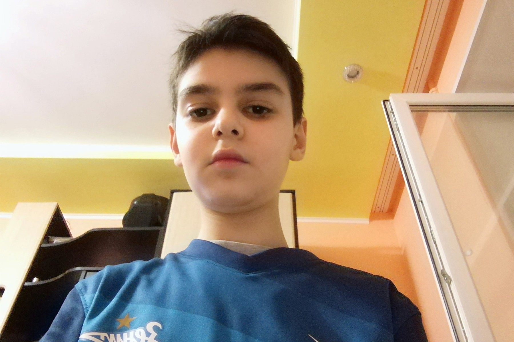 Arseny Turbin, 15, the youngest person on Russia's list of 'extremists and terrorists', was sentenced to 5 years in a juvenile jail for spreading leaflets 'containing statements that negatively evaluate President Putin'. Arseny pictured as a young child.