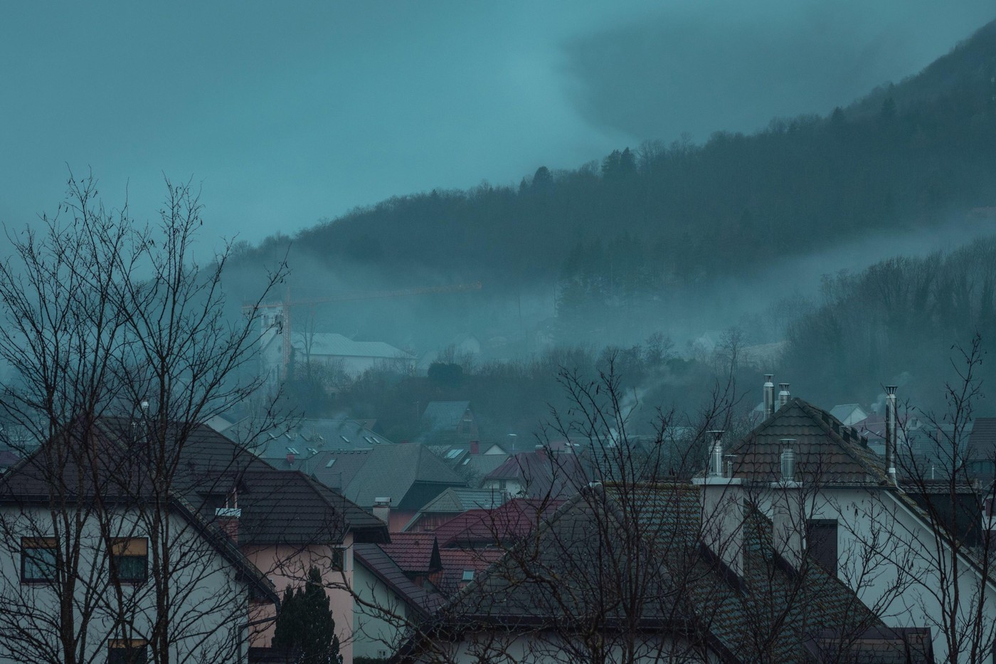 Winter panorama of Bovec, Slovenia in cloudy rainy winter time. Bad weather makes everyone a lazy person.
