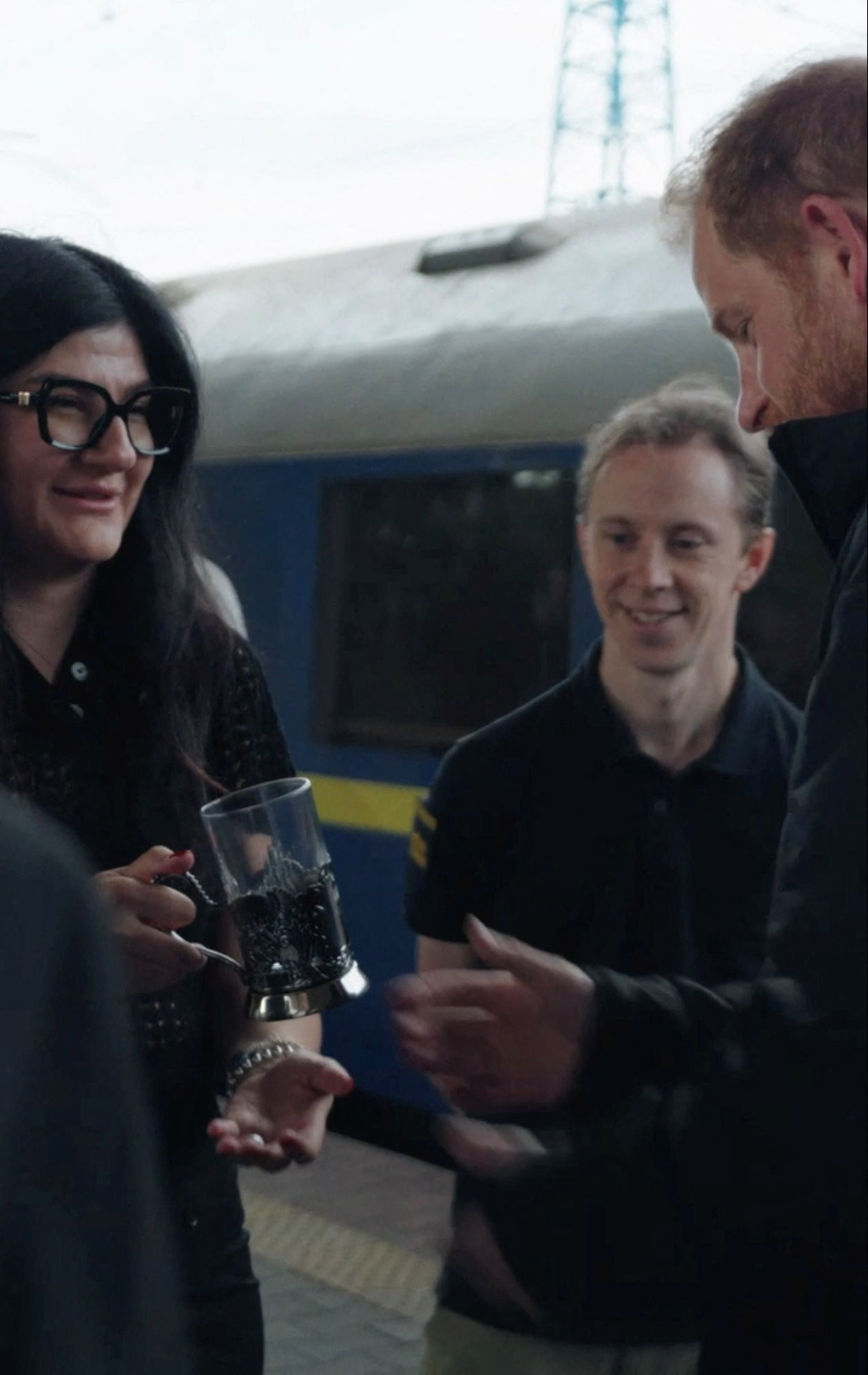 Britain's Prince Harry receives a gift mug upon his arrival by train to Kyiv, Ukraine, September 12, 2025, in this still image taken from social media video. Ukrzaliznytsia via REUTERS  THIS IMAGE HAS BEEN SUPPLIED BY A THIRD PARTY. MANDATORY CREDIT.