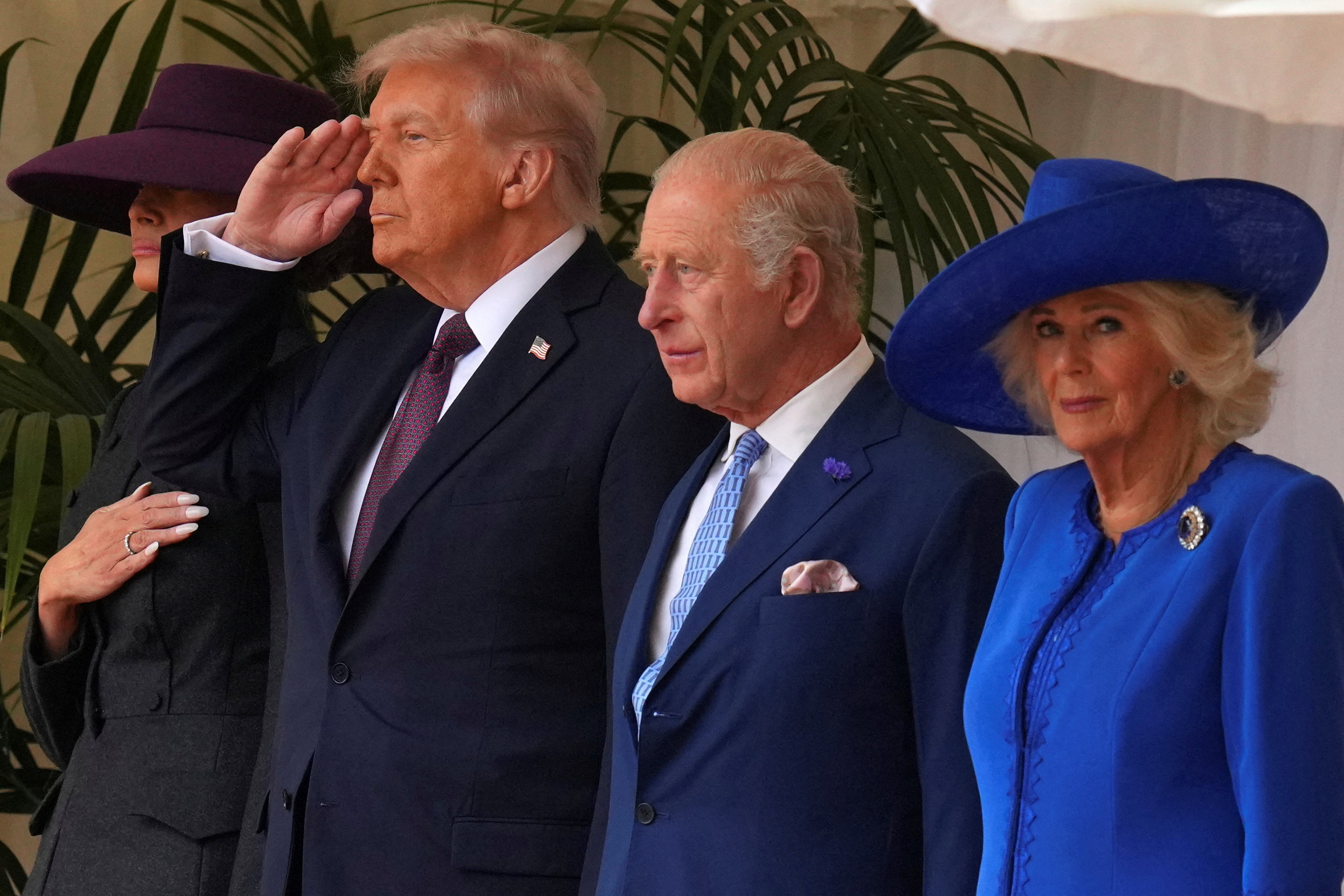 Donald in Melania Trump na obisku britanske kraljeve družine