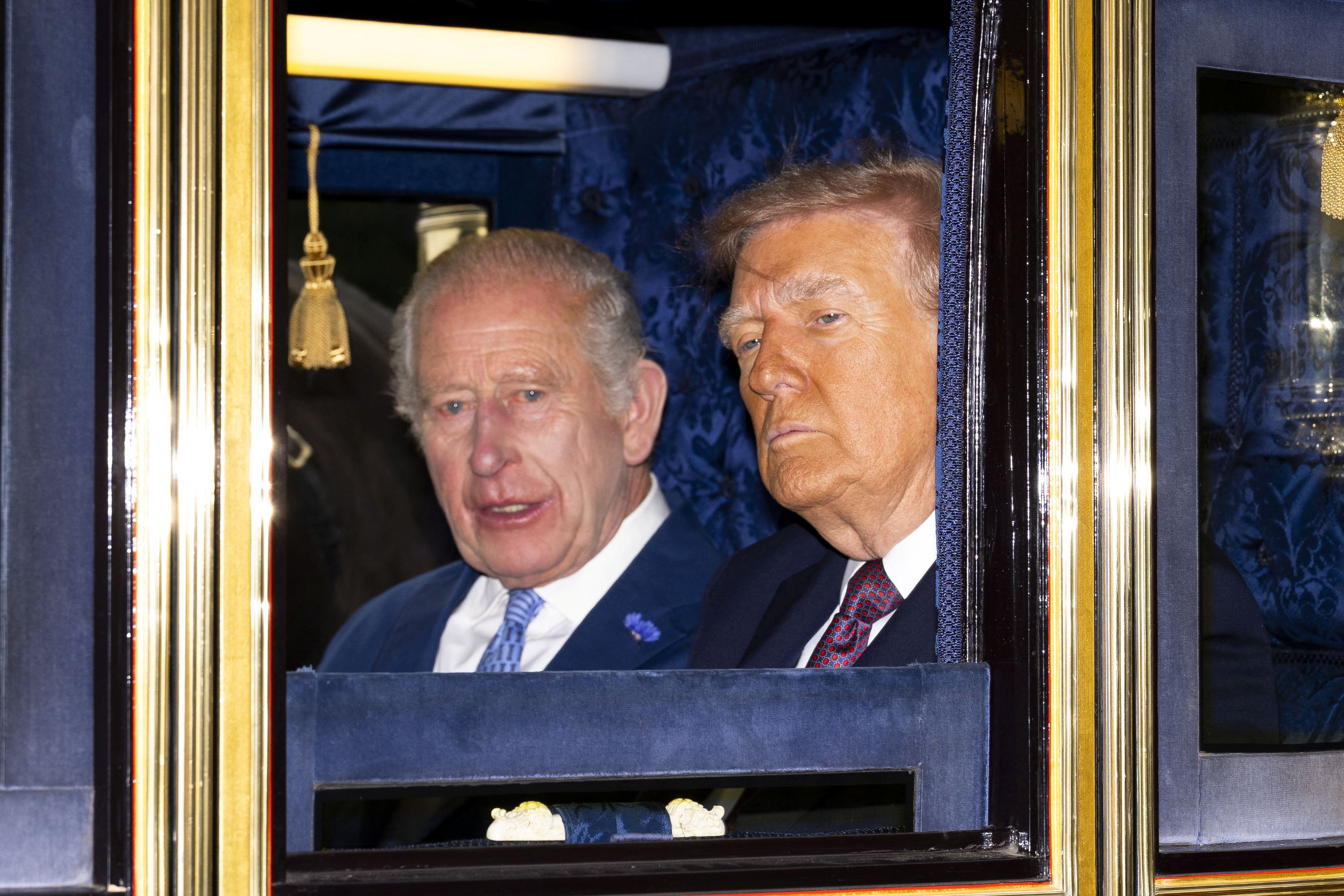 Donald in Melania Trump na obisku britanske kraljeve družine