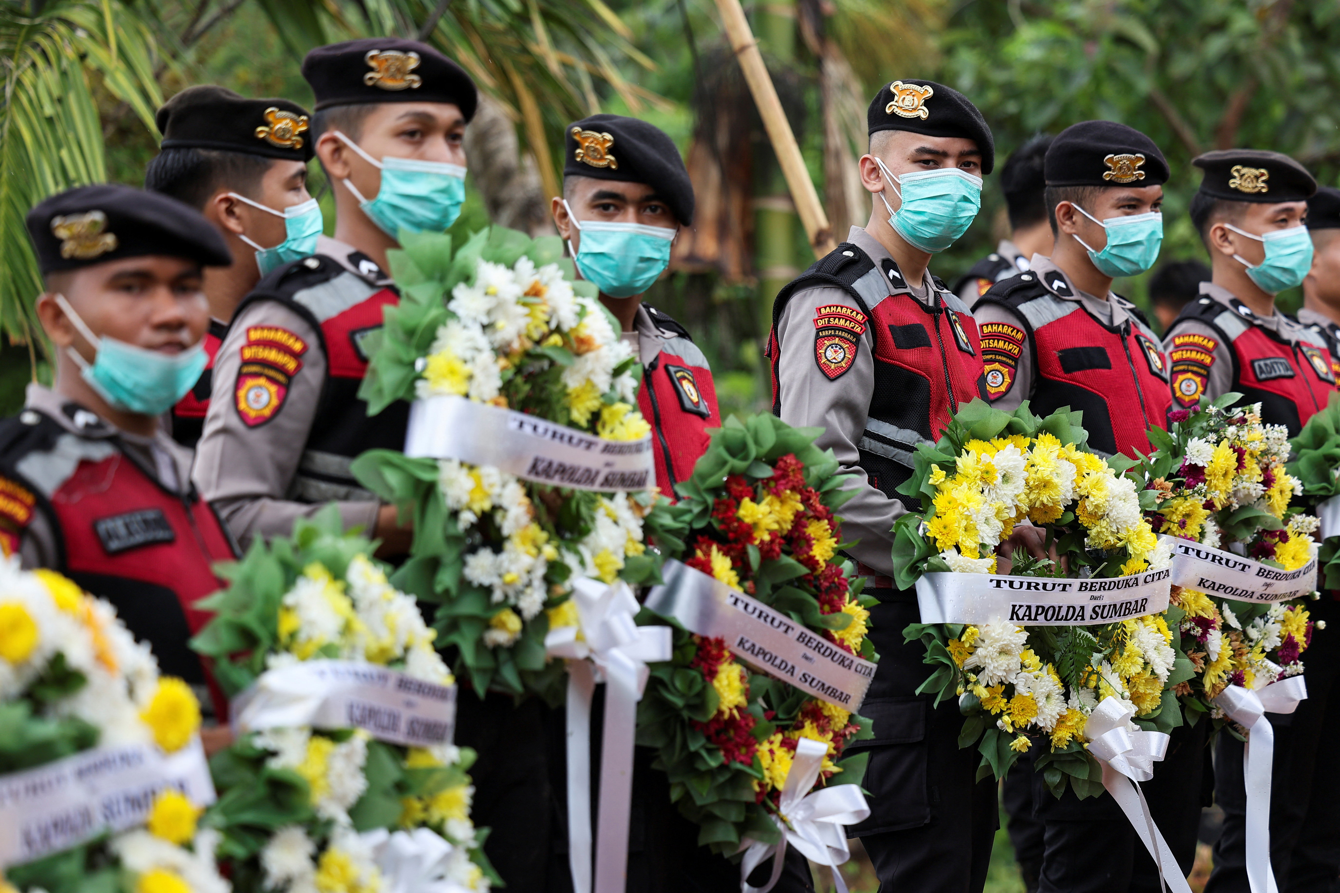Pogreb za žrtve poplav v Indoneziji