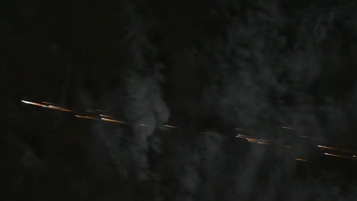 razpad rakete ali satellita nad Afriko kot ga je videl astronavt na MVP