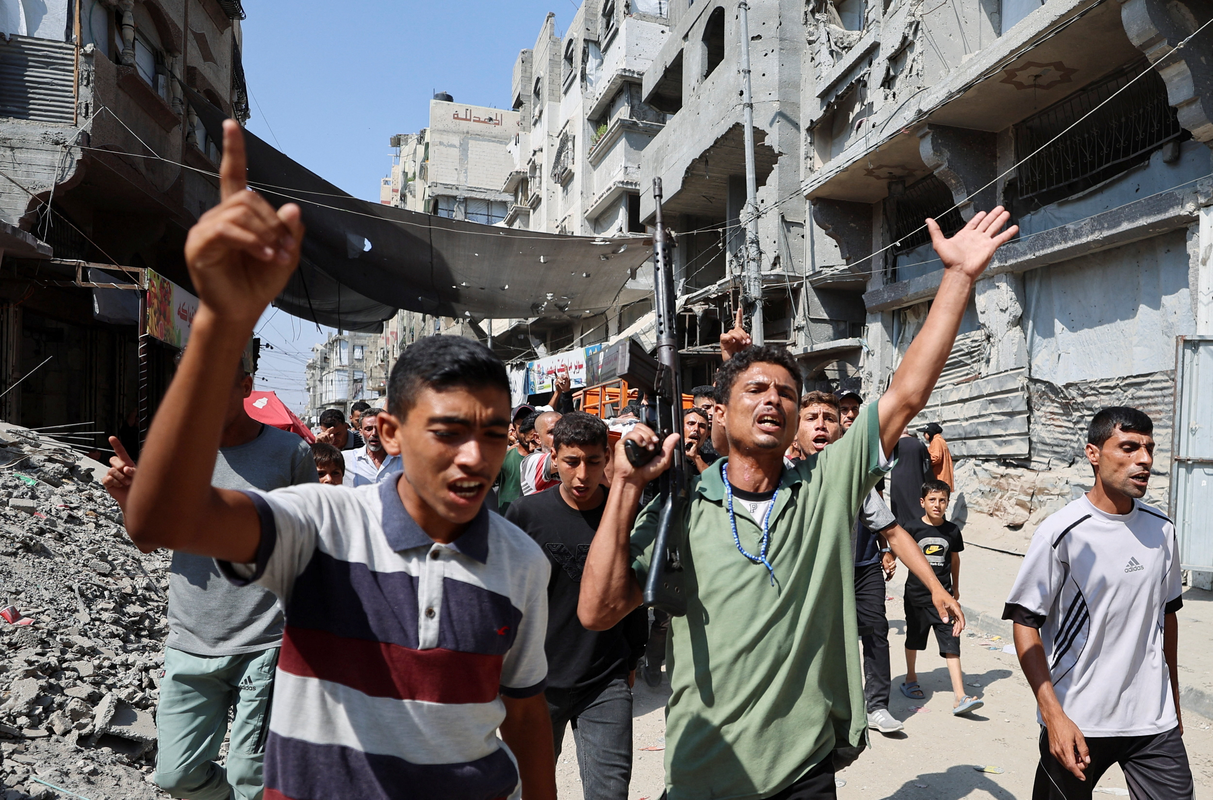 Pogreb enega od Palestincev, ubitega v izraelskem napadu