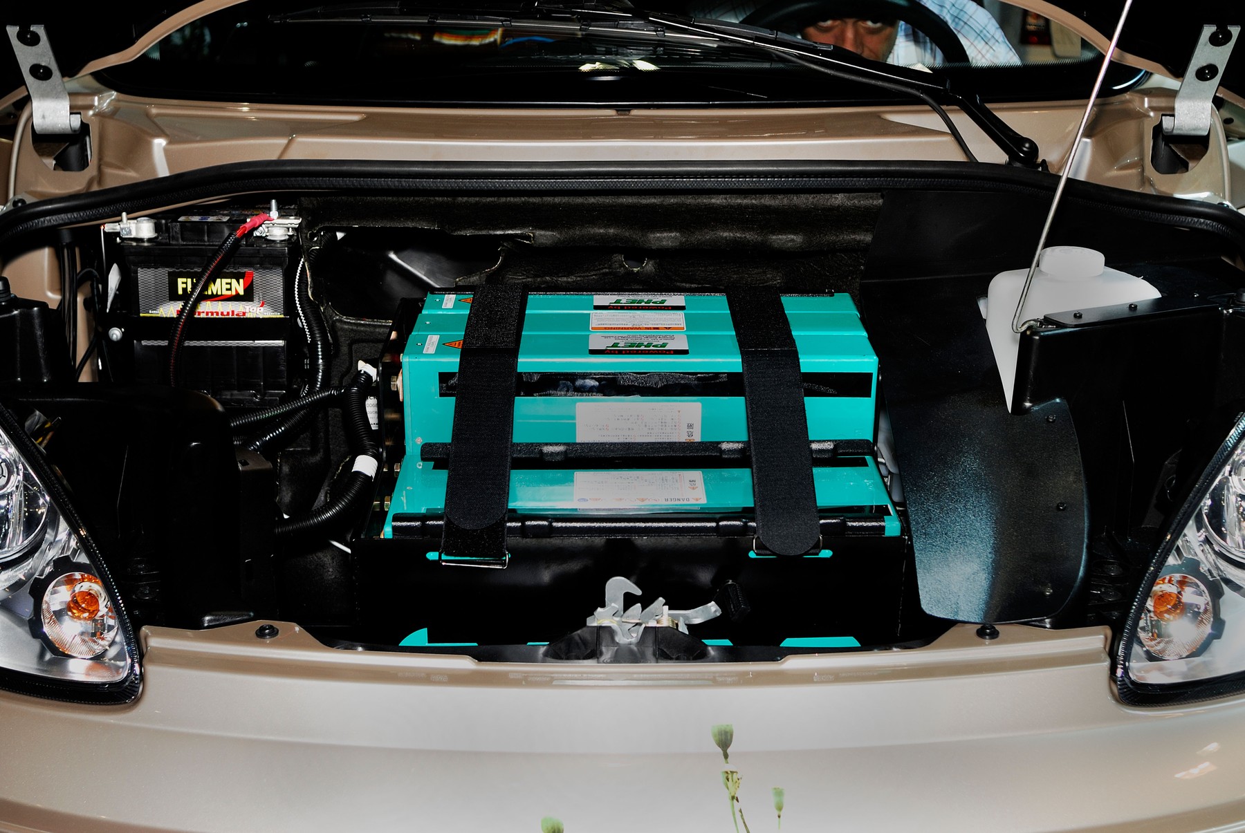 "Paris Auto Show" French "Electric Micro Car" Detail Open Hood SHowing Electric Motor Batteries "Ligier Car company" "Phet Prismatic" Battery,Image: 34382820, License: Rights-managed, Restrictions: , Model Release: no