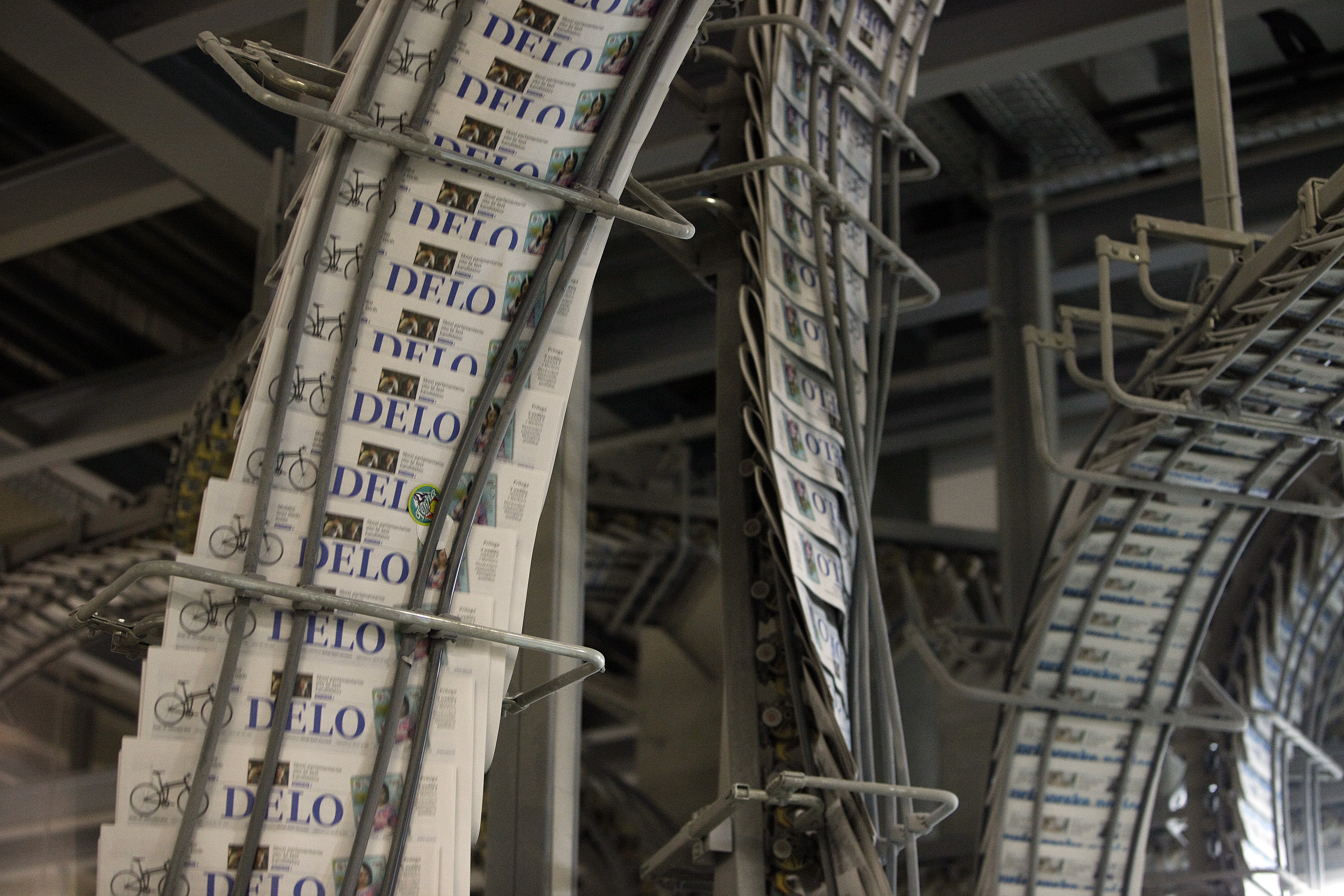 Slovenija Ljubljana 15.09.2014, 15. september 2014Tiskanje časopisa, papir, tiskarna, delavec, kolportaža, novinarstvo,  ilustracija posel časopis Delo  Foto: Srđan Živulović /BOBO