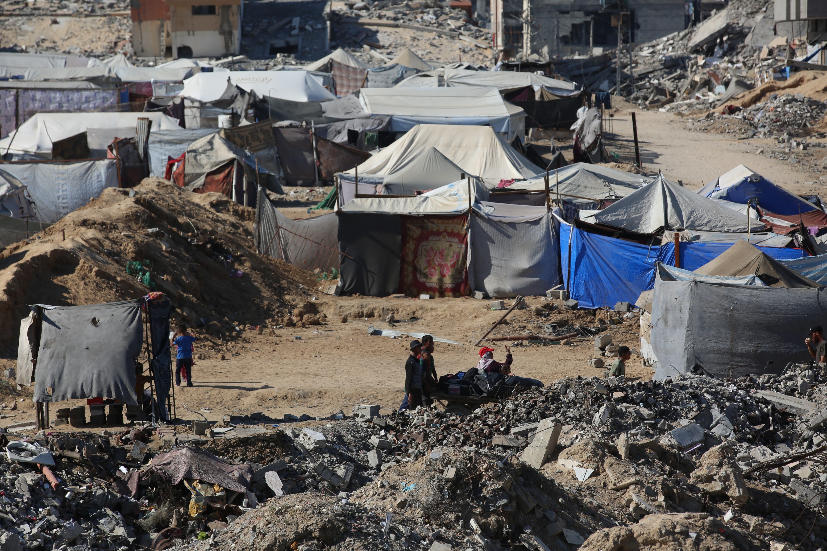 GAZA CITY, GAZA - OCTOBER 26: Palestinian families returning to thei