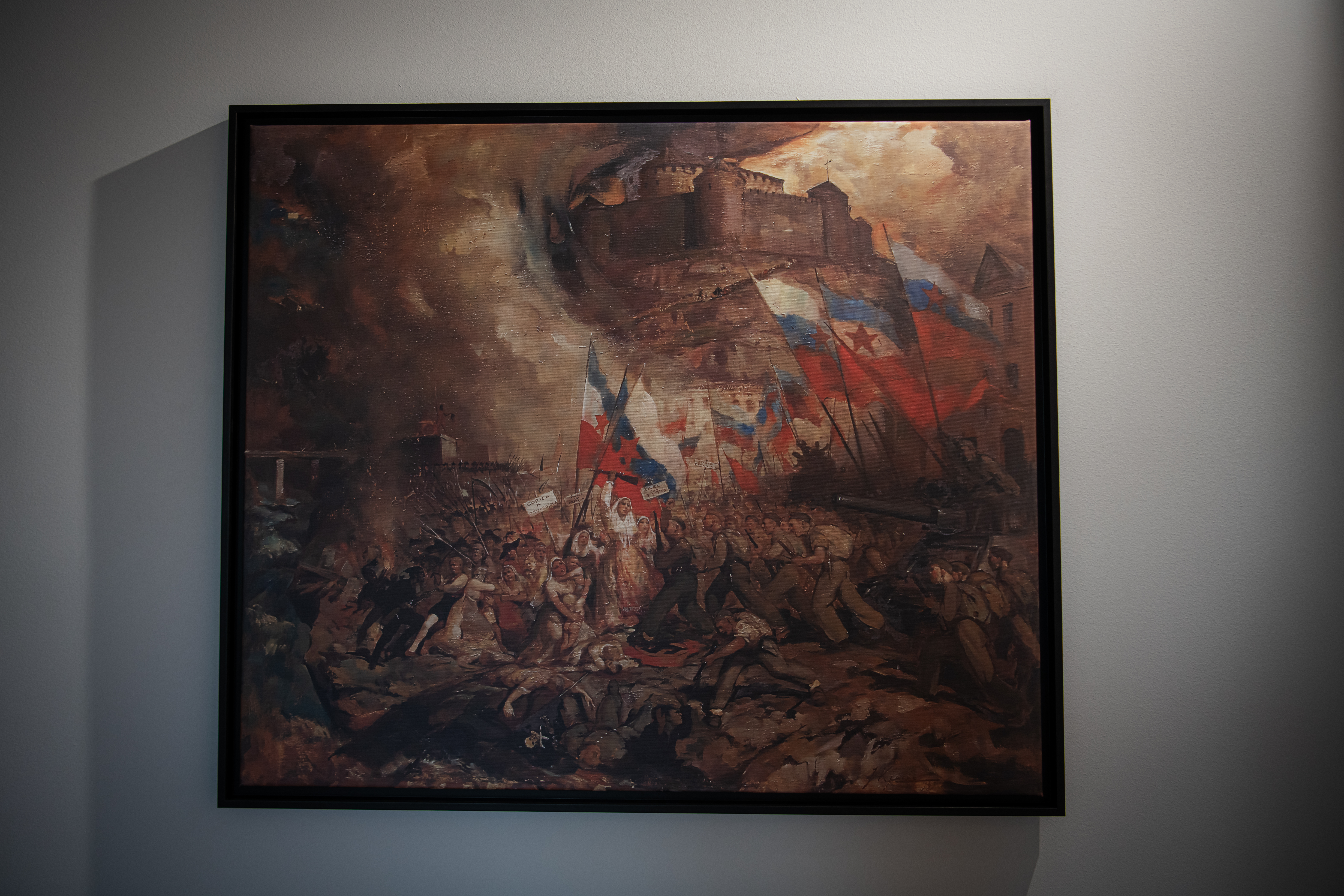 Slika prihoda partizanov v Gorico, ki vleče vzporednice s tolminskim puntom