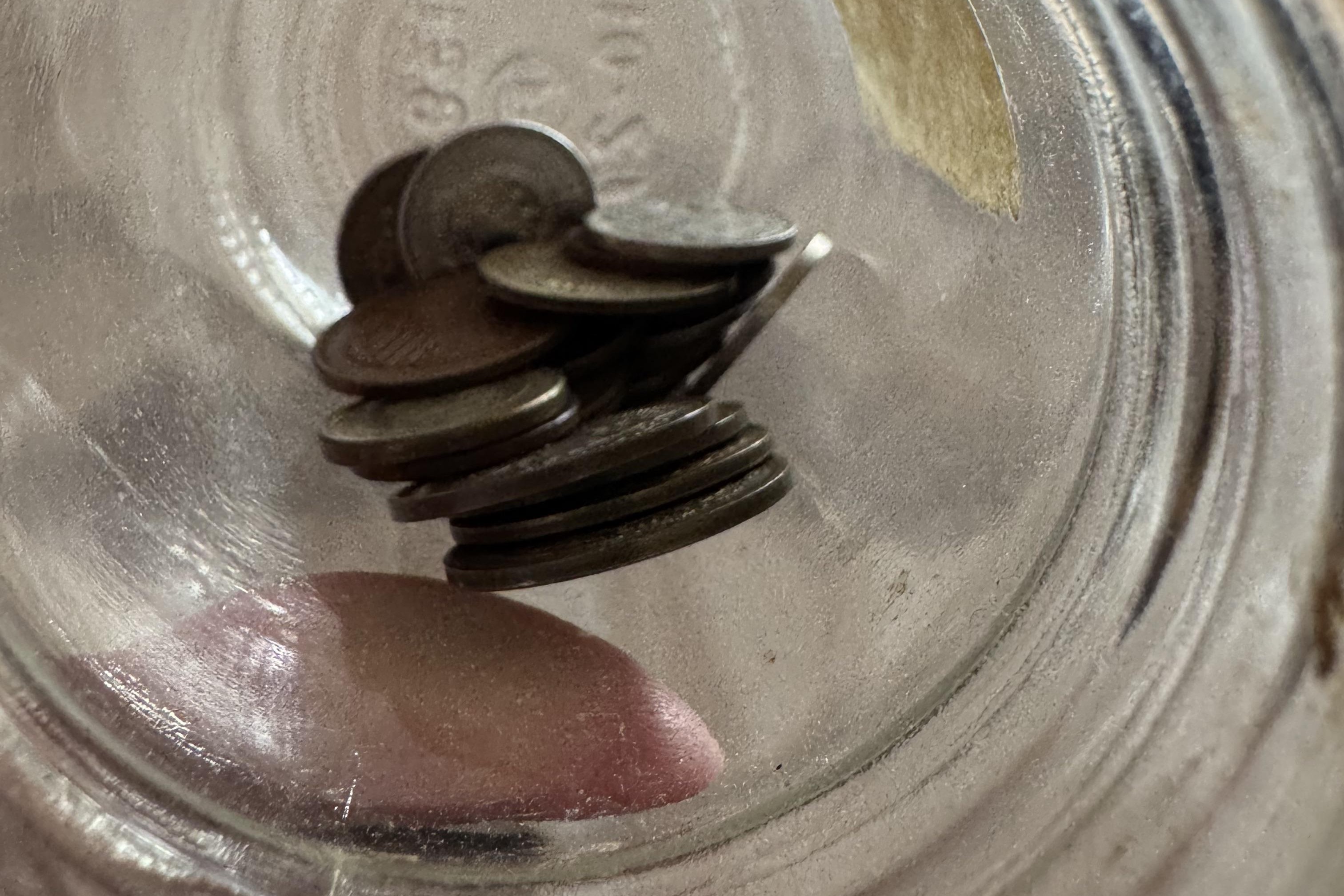 Žetoni v kozarcu zbirke redkih kovancev