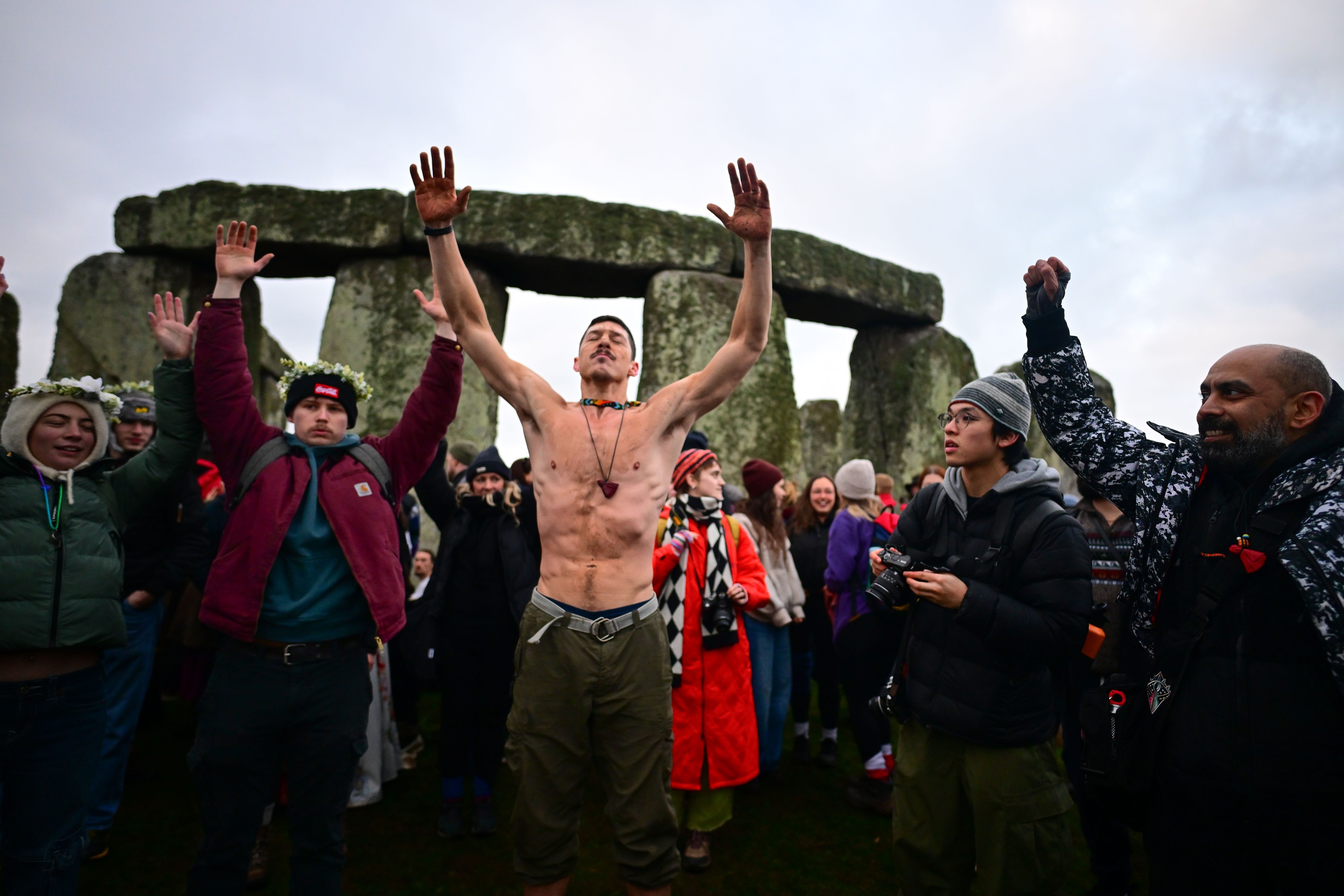 People gather at Stonehenge for the Winter SolsticeWinter Solstice at Stonehenge, Salisbury Plain, Wiltshire, UK - 21 Dec 2025,Image: 1060811058, License: Rights-managed, Restrictions: , Model Release: no