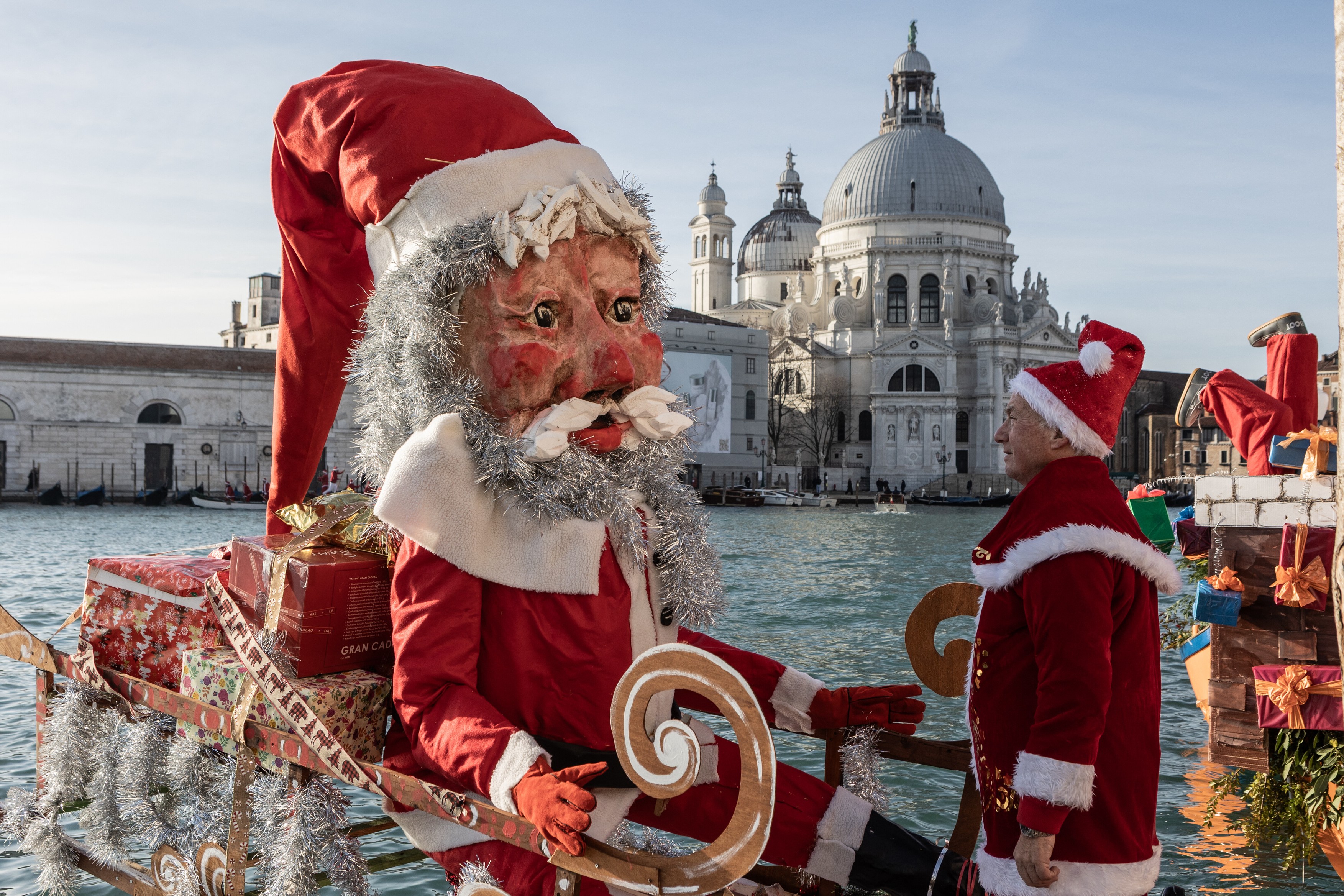 VENICE, ITALY - DECEMBER 21: Participants in the Santa Claus water parade