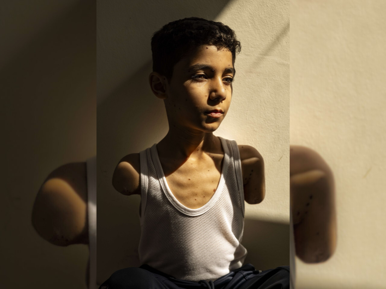 palestinski deček, fotografija, Samar Abu Elouf